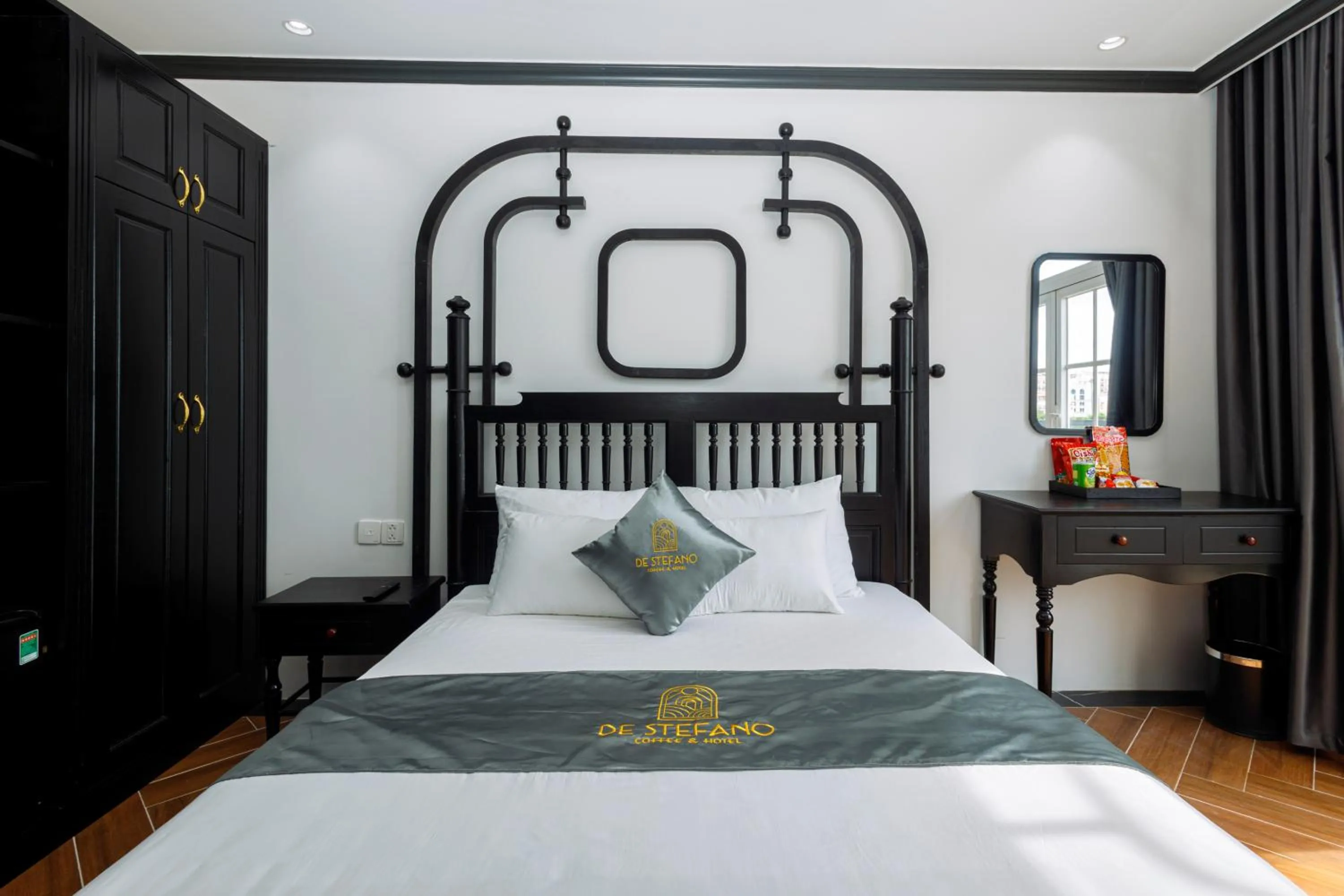 Bed in De Stefano Coffee and Hotel