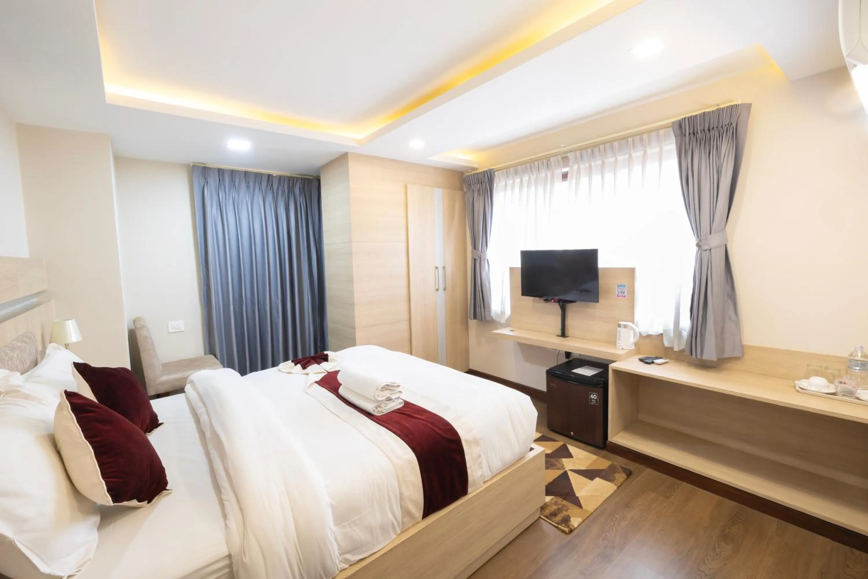 Bed in Divine Kathmandu Hotel