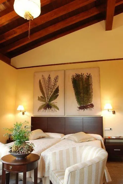 Bed in OLATZEA LANDA HOTELA