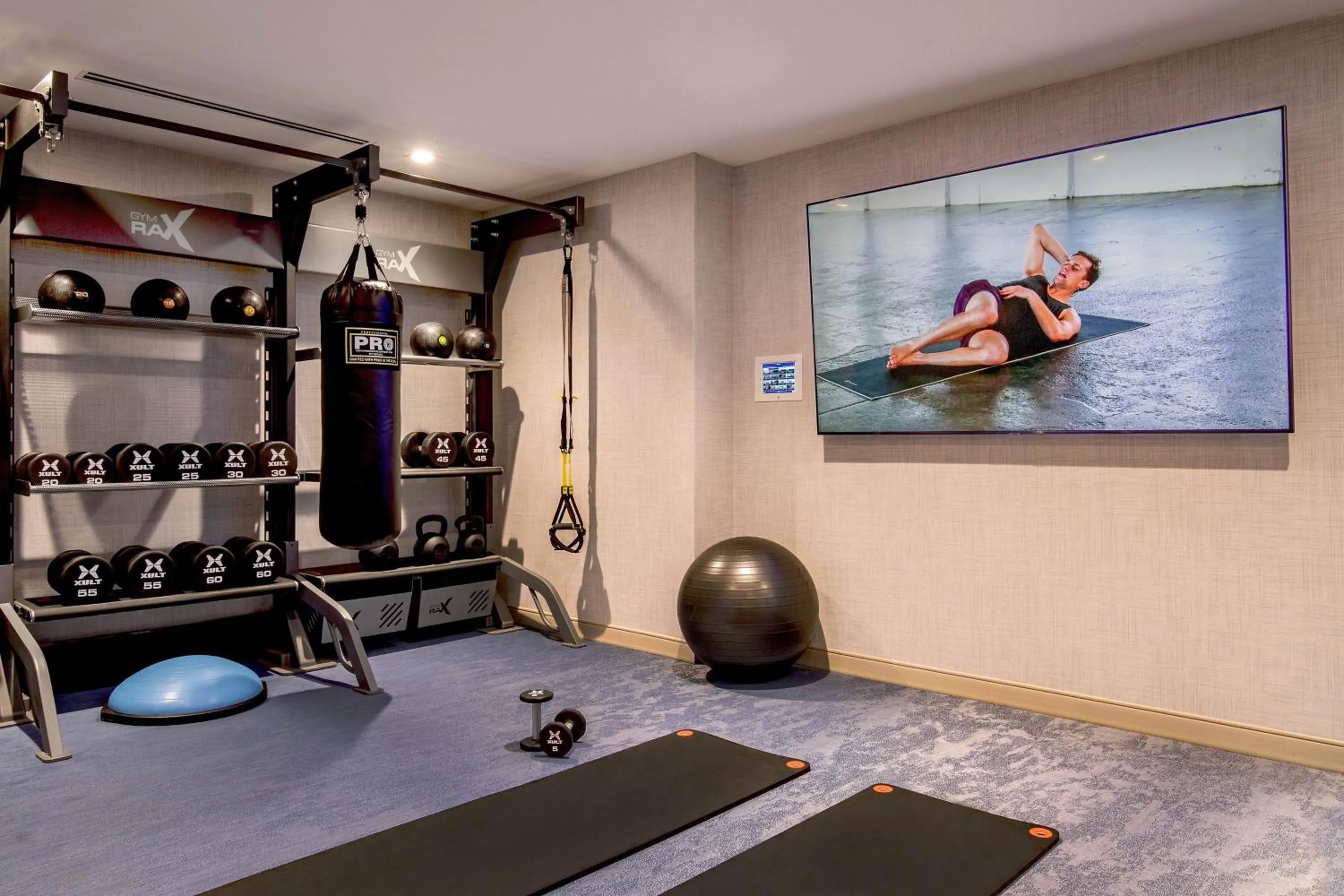 Fitness centre/facilities in The Artisan at Tuscan Village, Salem, NH, a Tribute Portfolio Hotel