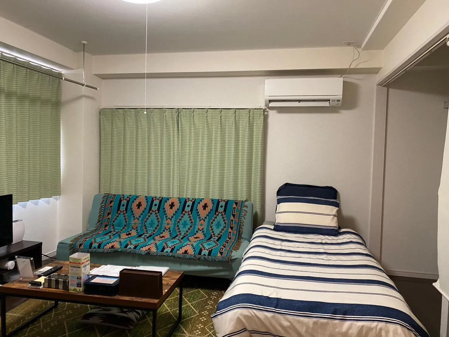 Bed in Oyado Kinokuniya Daikokumachi