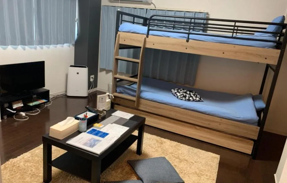 Bed in Oyado Kinokuniya Daikokumachi