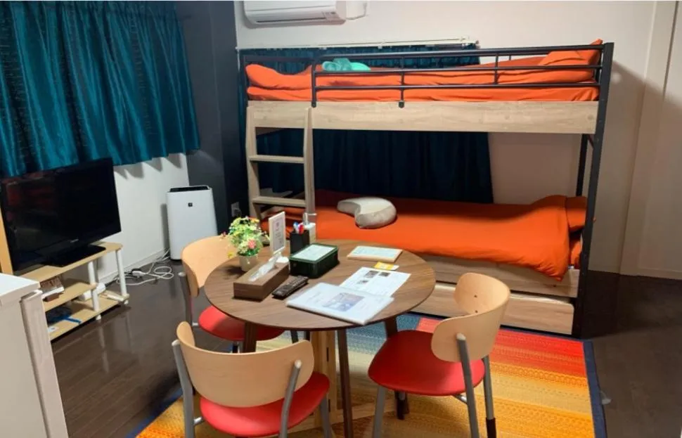 Bed in Oyado Kinokuniya Daikokumachi