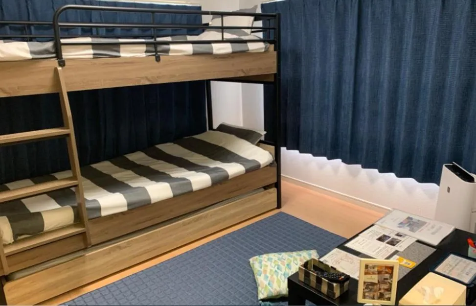 Bed in Oyado Kinokuniya Daikokumachi