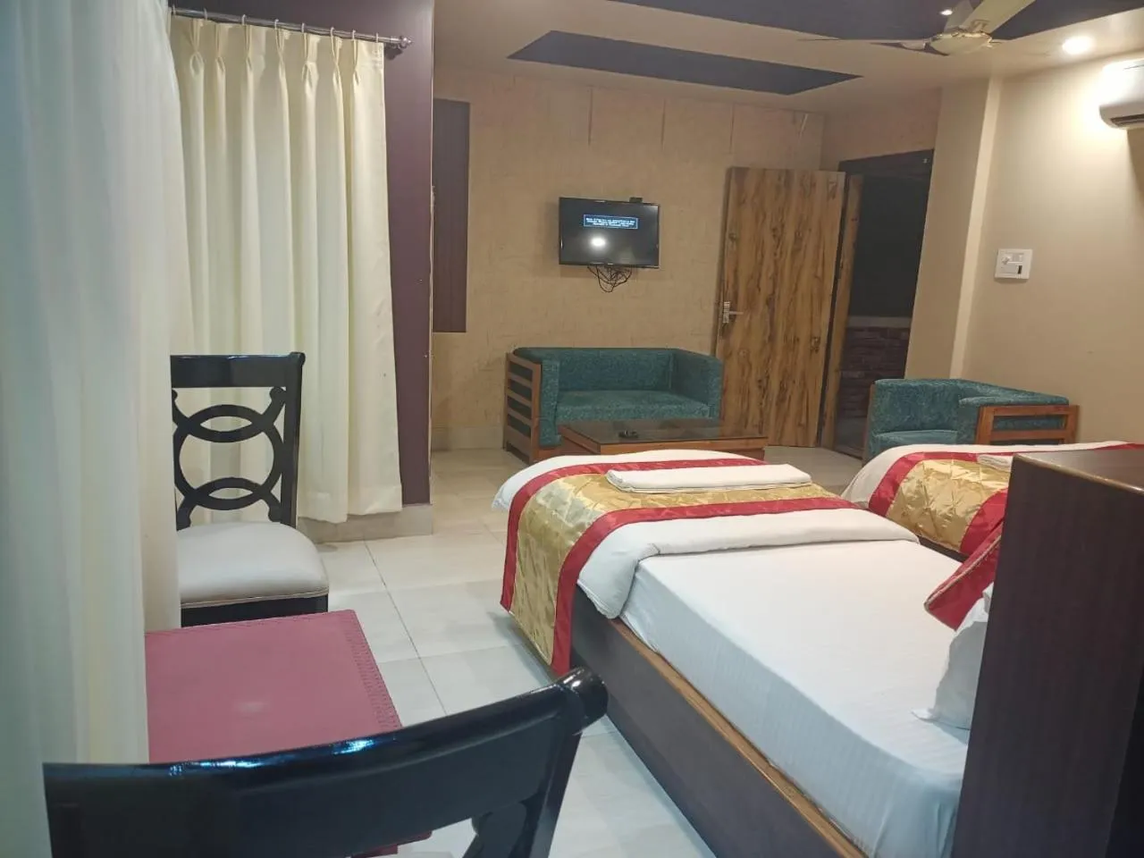 Bed in The Brahmaputra Hotel