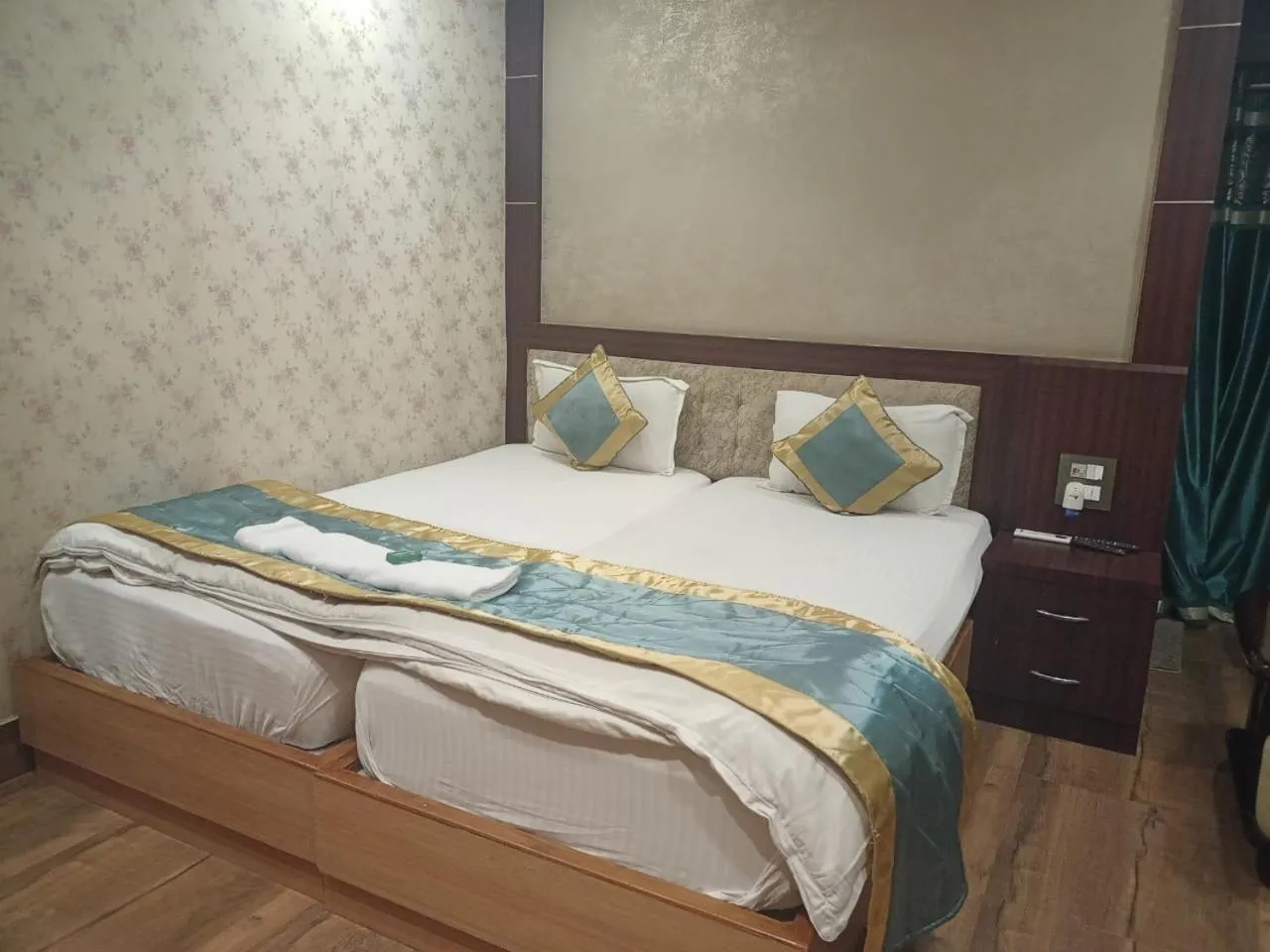 Bed in The Brahmaputra Hotel