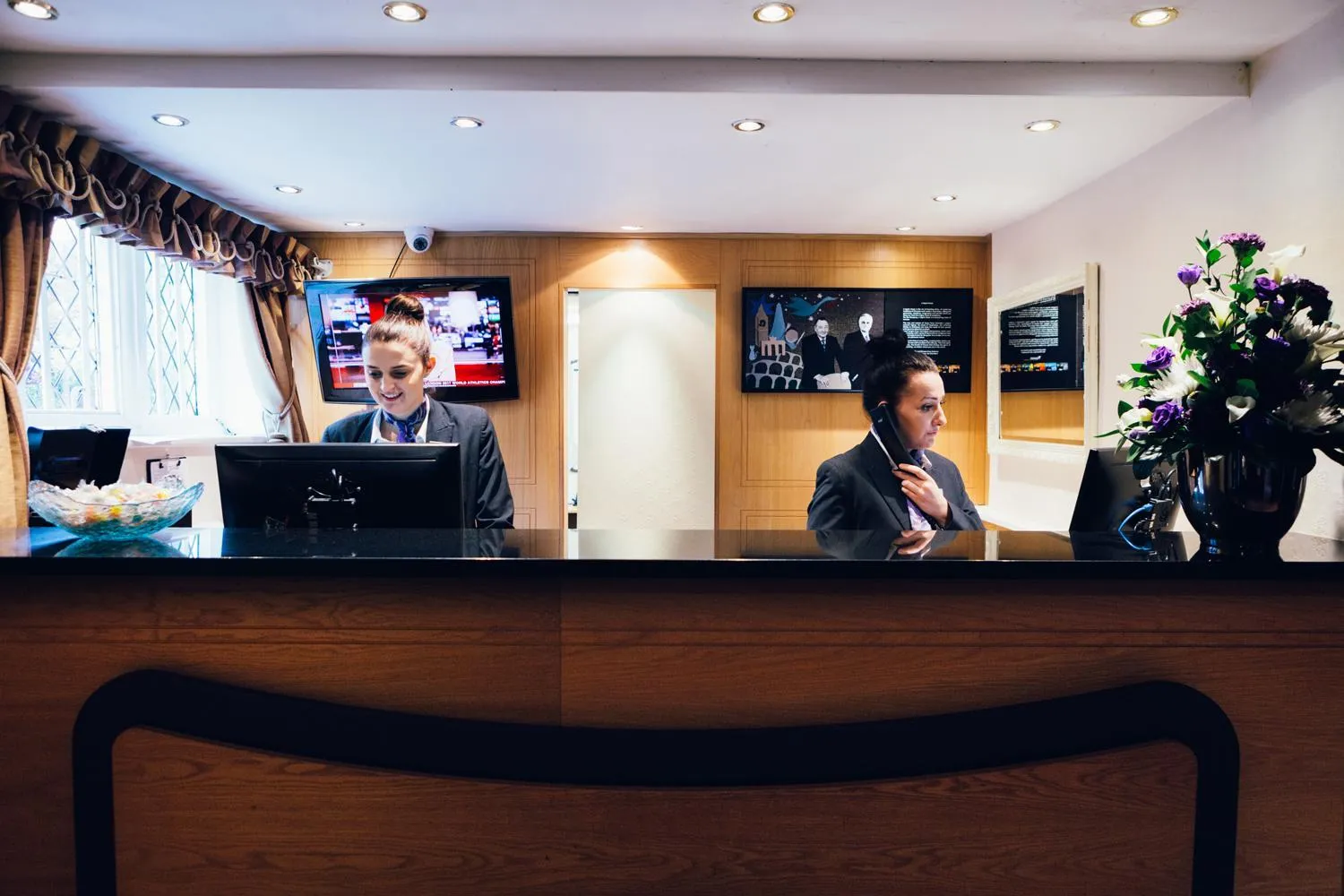 Lobby or reception in voco Letchworth Hall by IHG