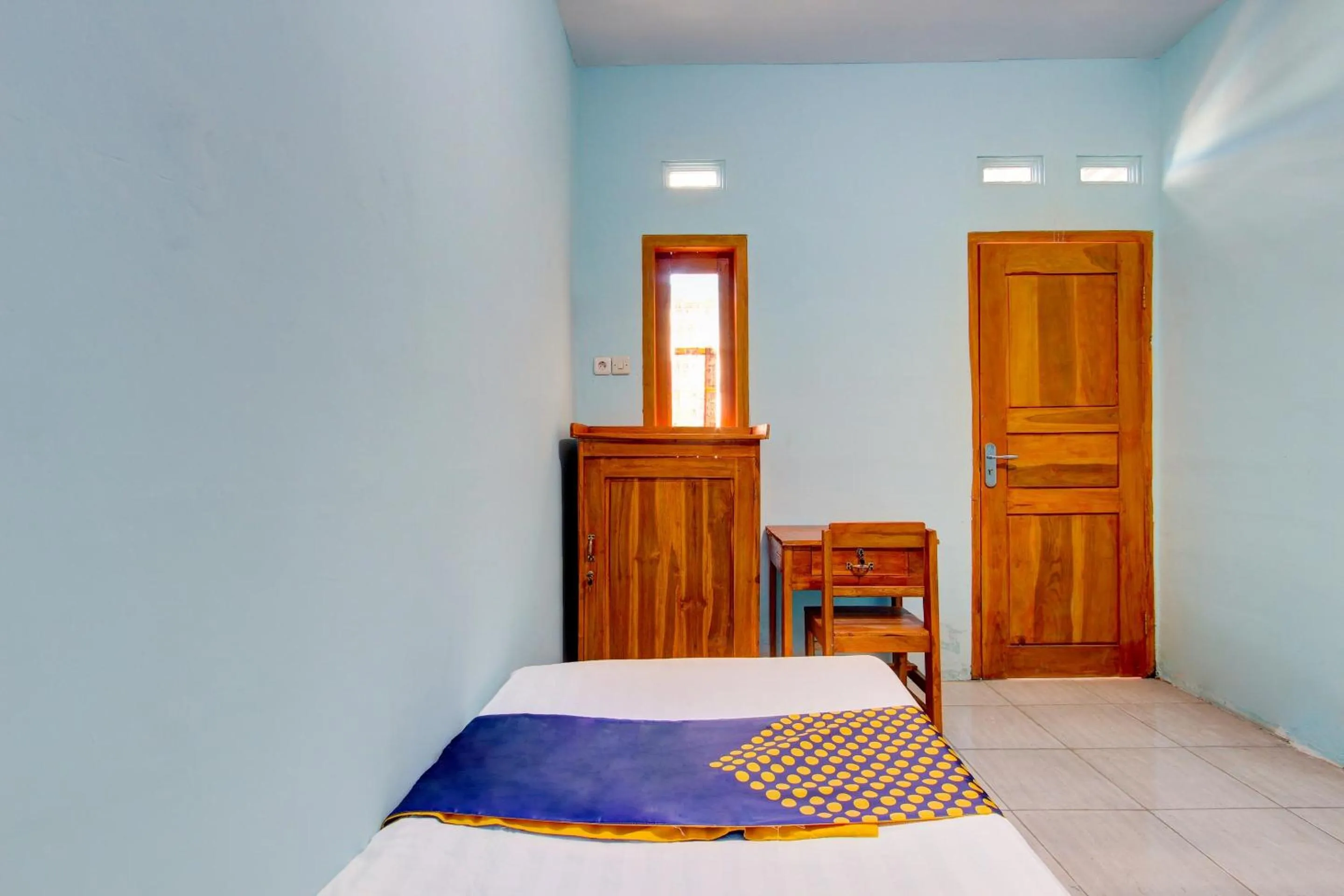 Bedroom in Hotel O Gioba Kost Syariah