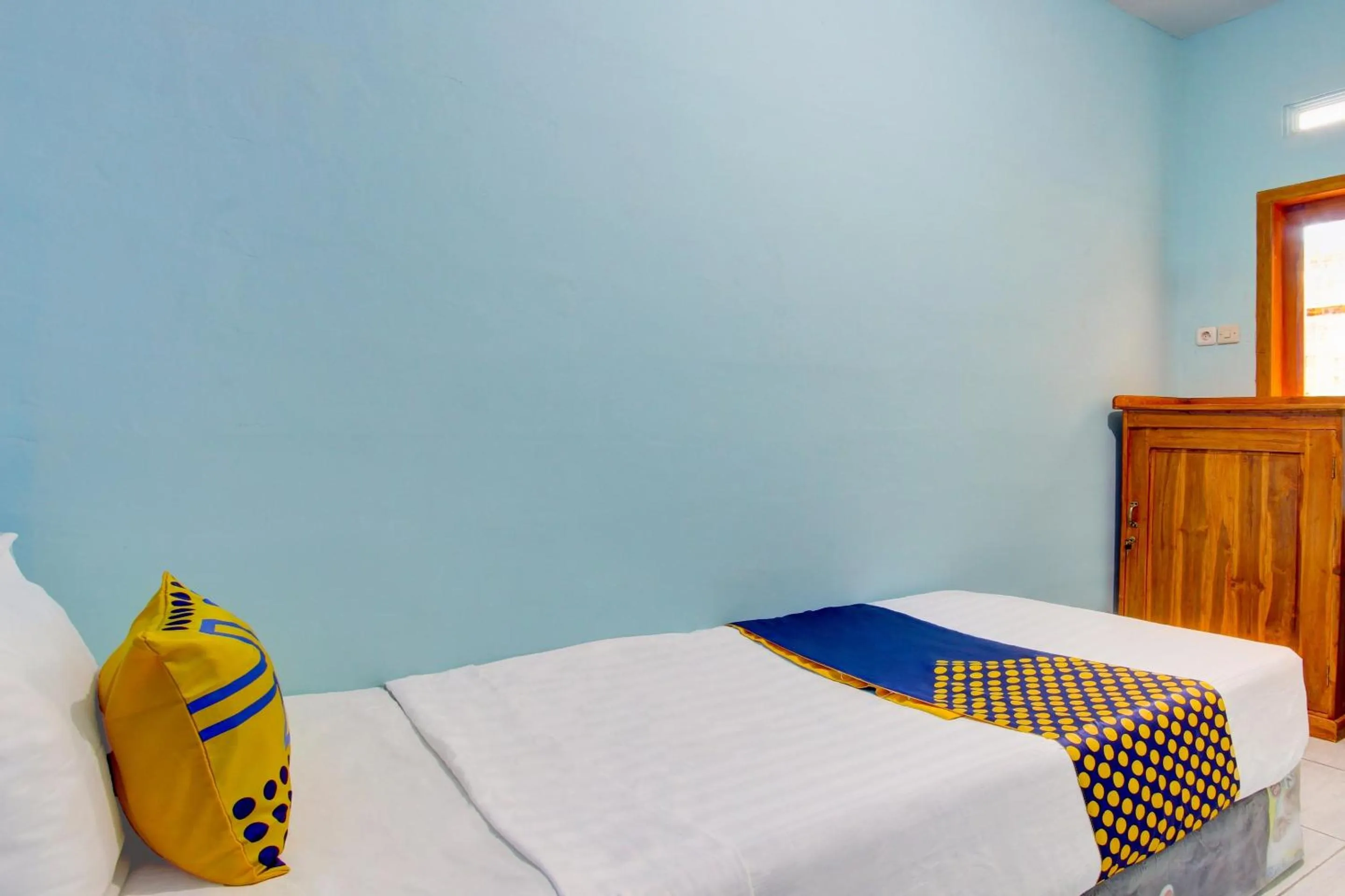 Bedroom in Hotel O Gioba Kost Syariah