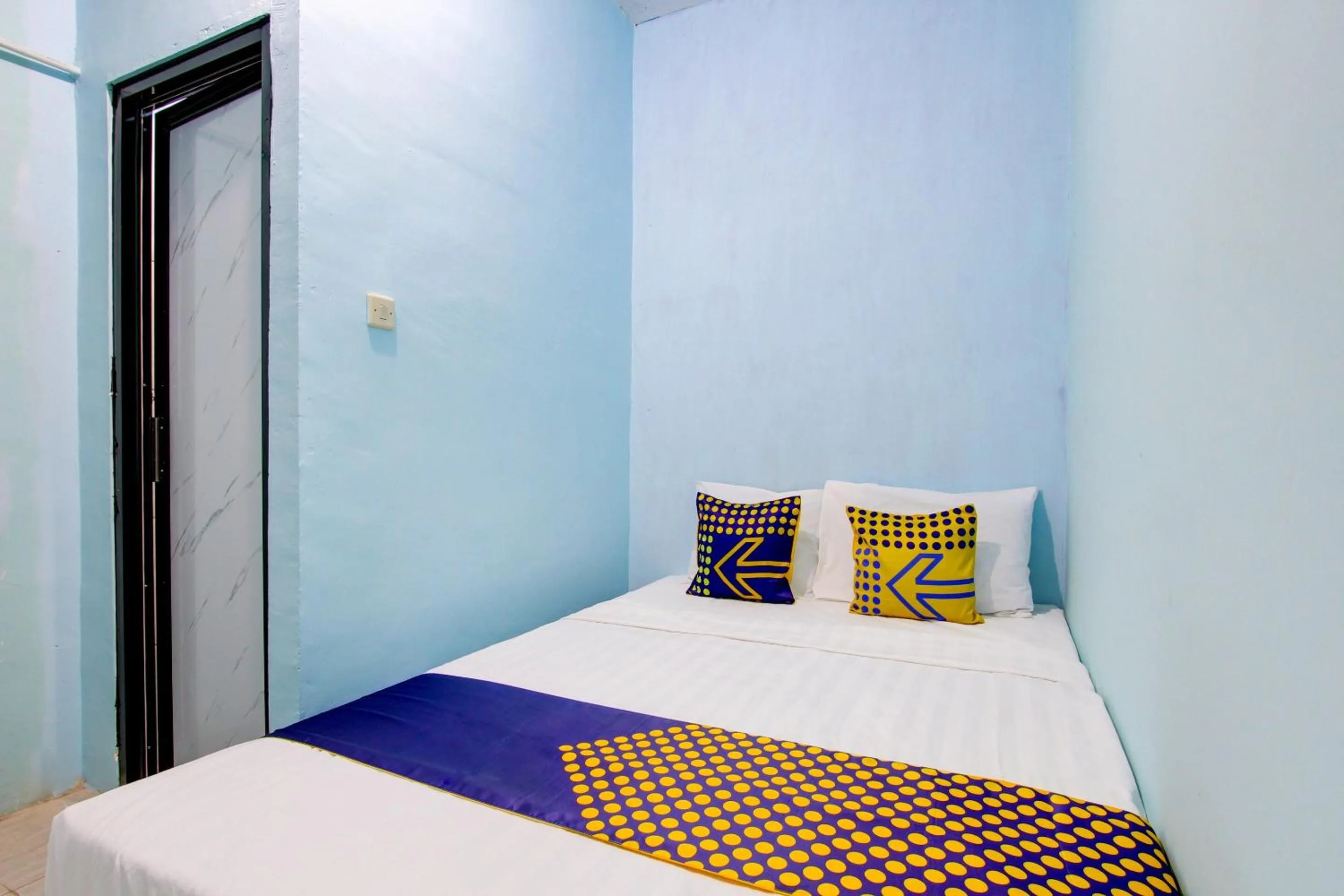 Bedroom in Hotel O Gioba Kost Syariah