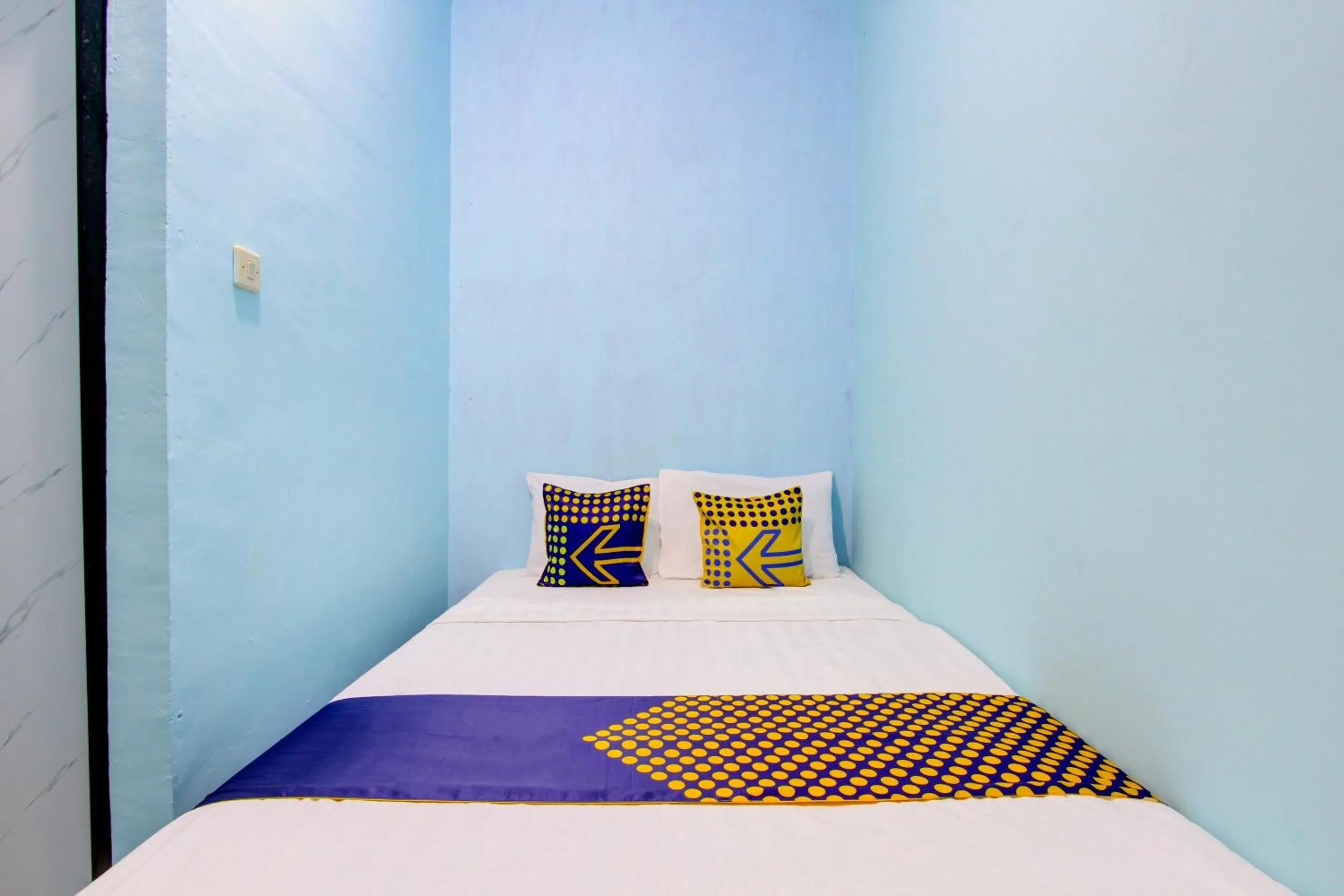 Bedroom in Hotel O Gioba Kost Syariah