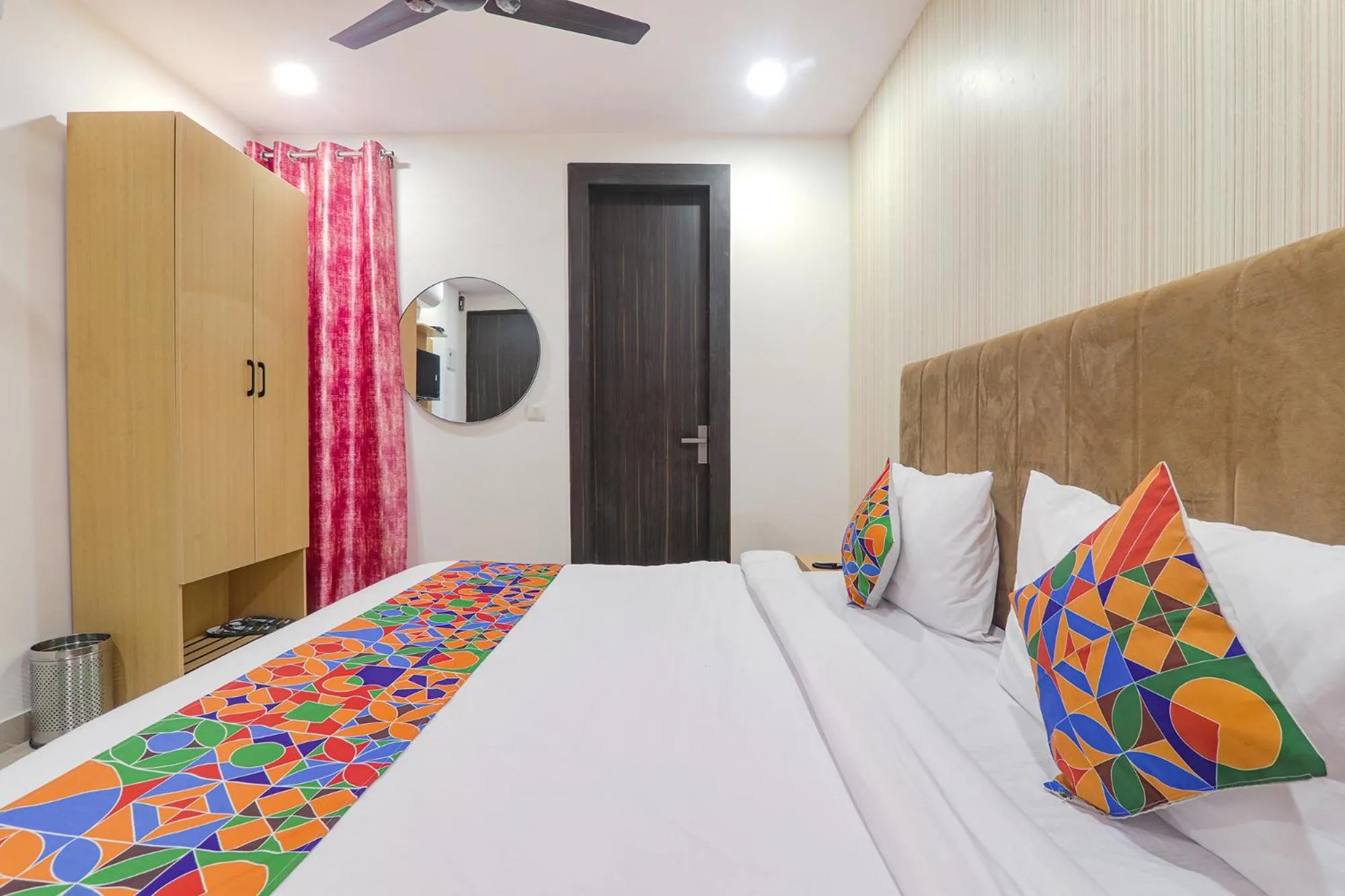 Bed in FabHotel The Comfort