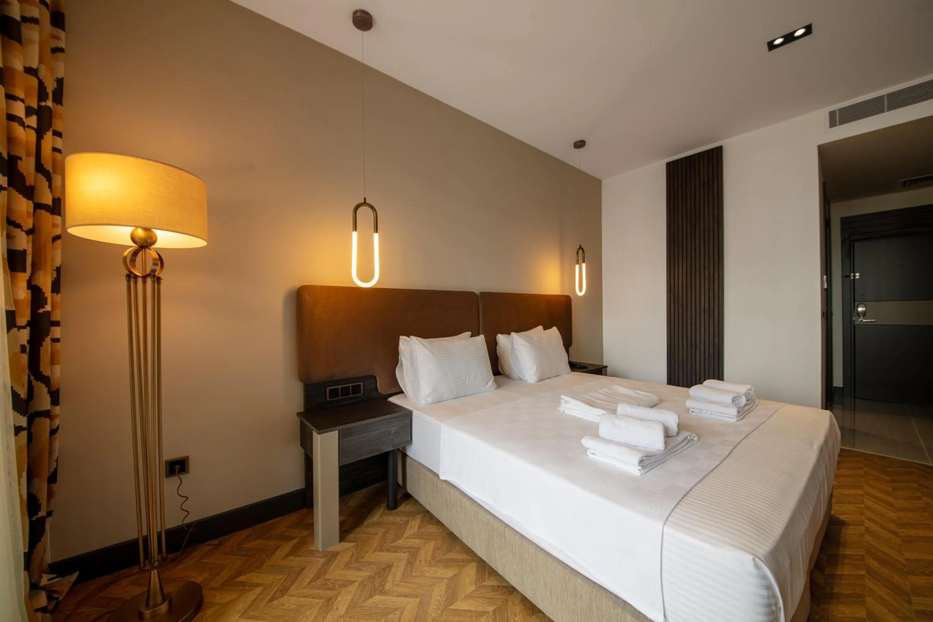 Bed in V Center Hotel