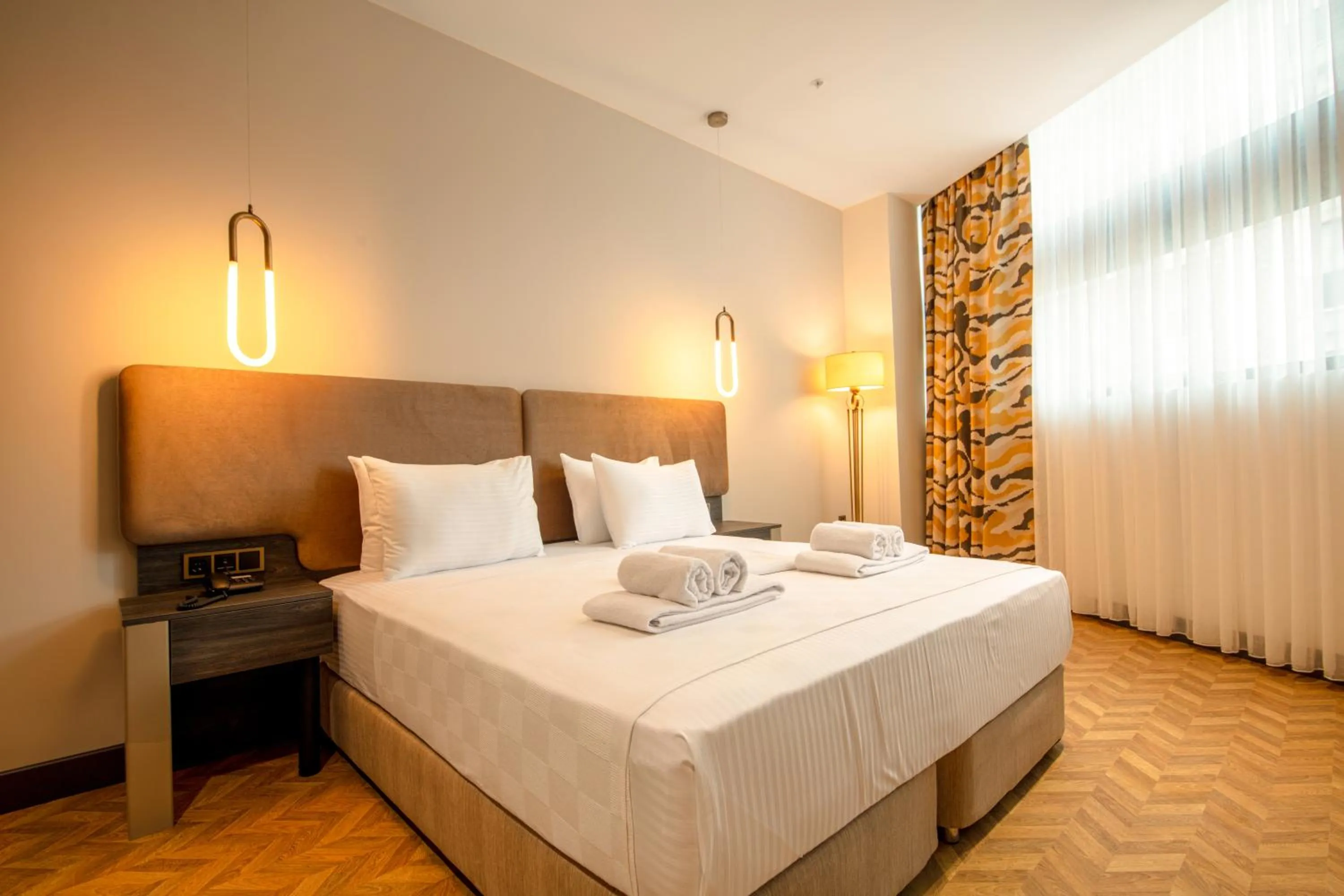 Bed in V Center Hotel