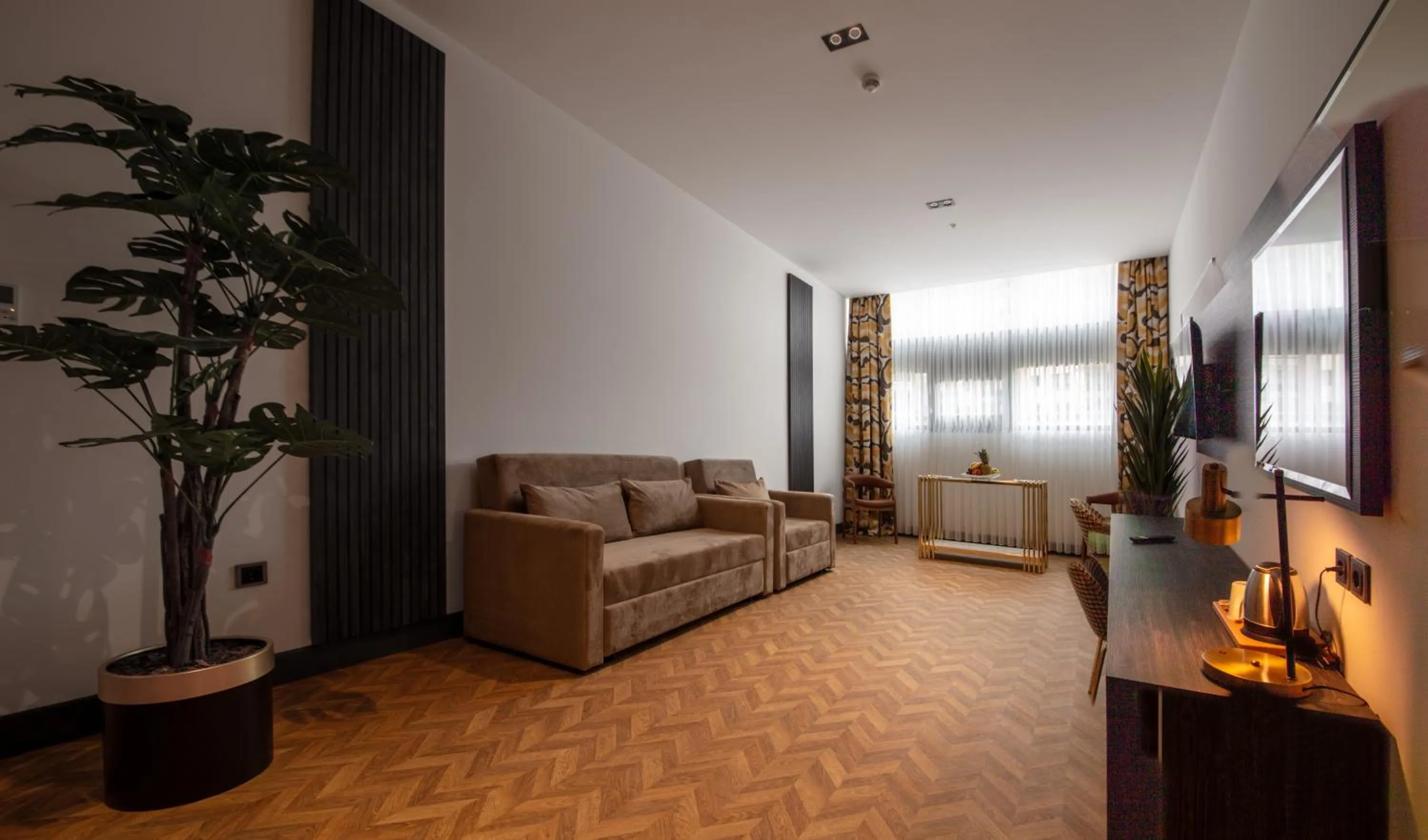 Living room in V Center Hotel