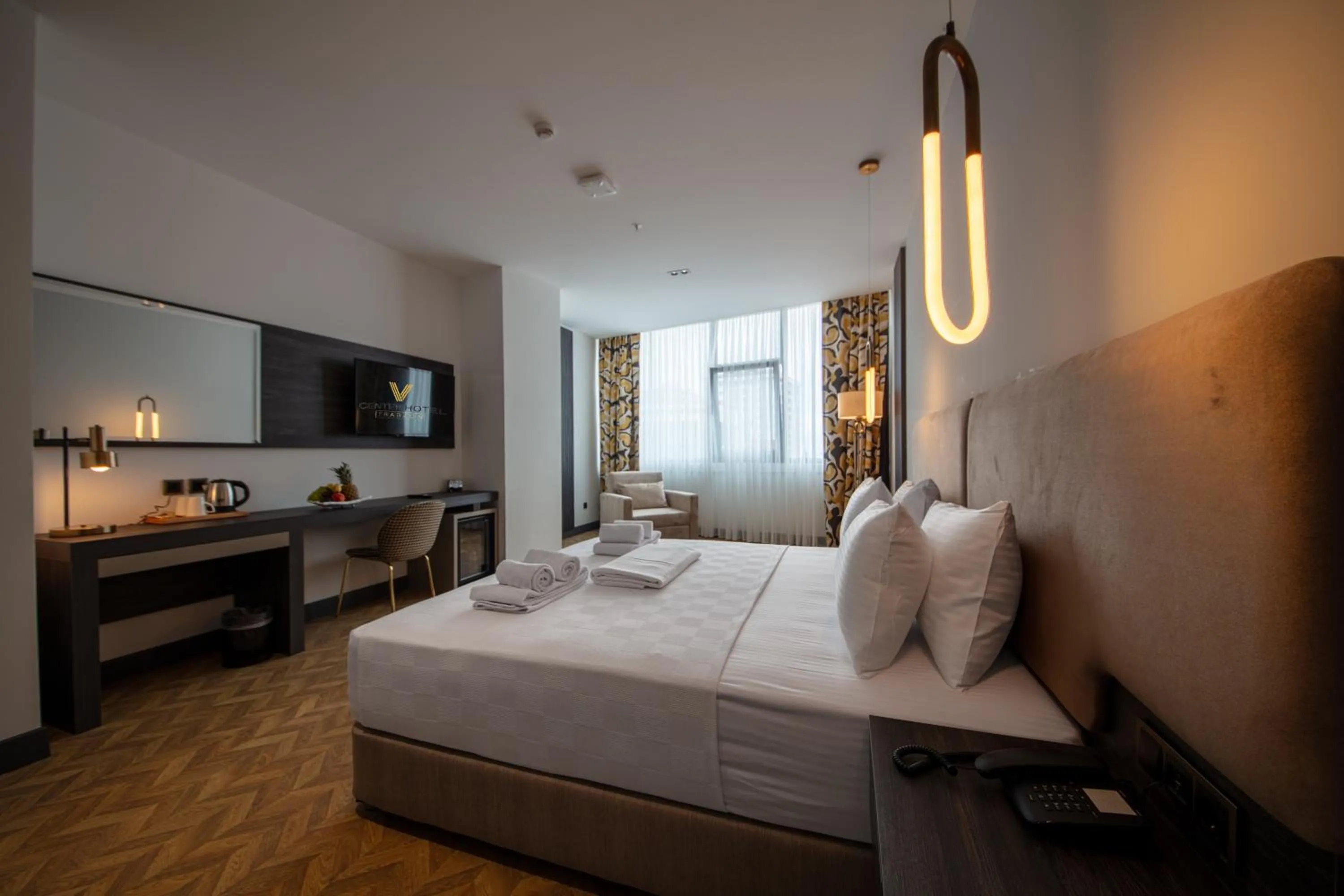 Bed in V Center Hotel