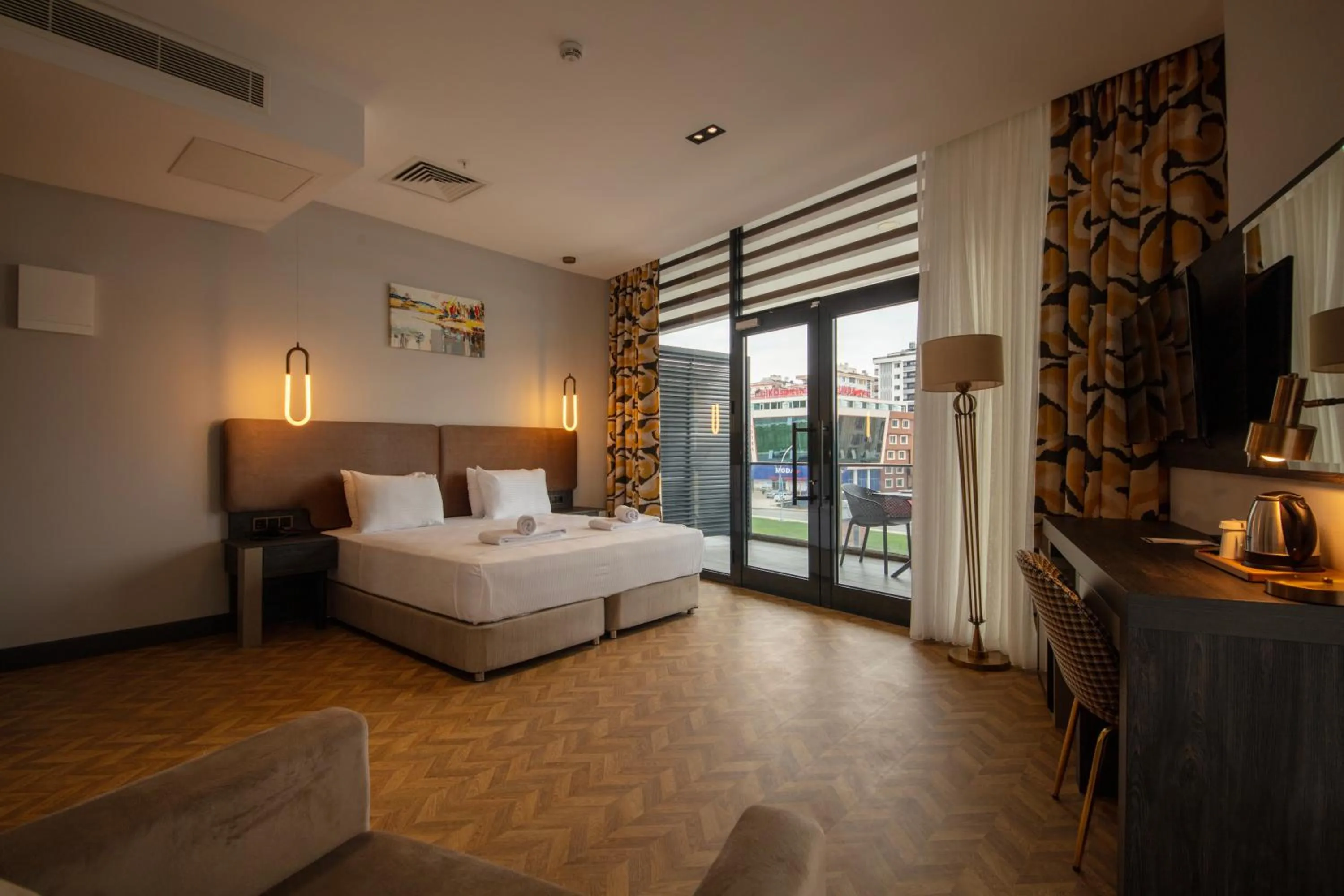 Bed in V Center Hotel