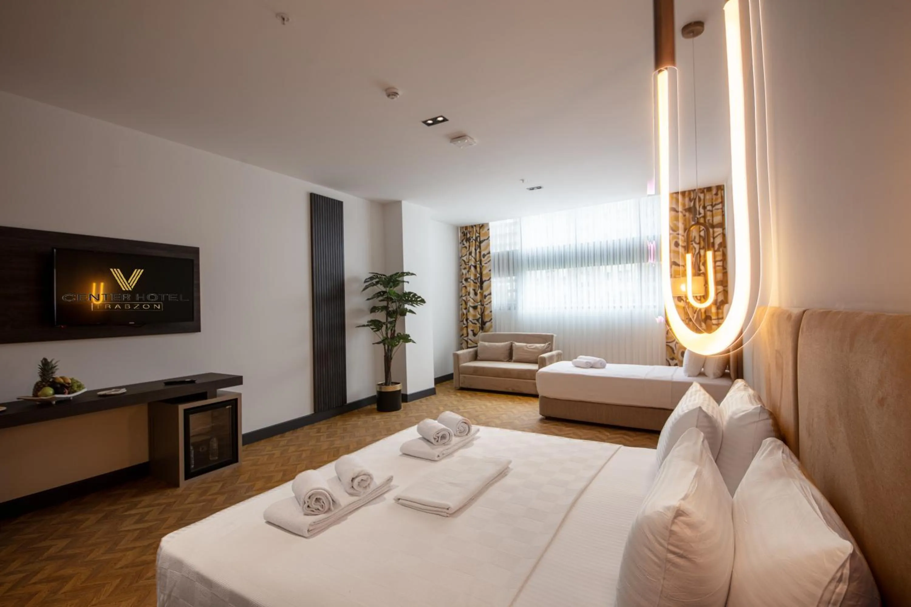 Bed in V Center Hotel