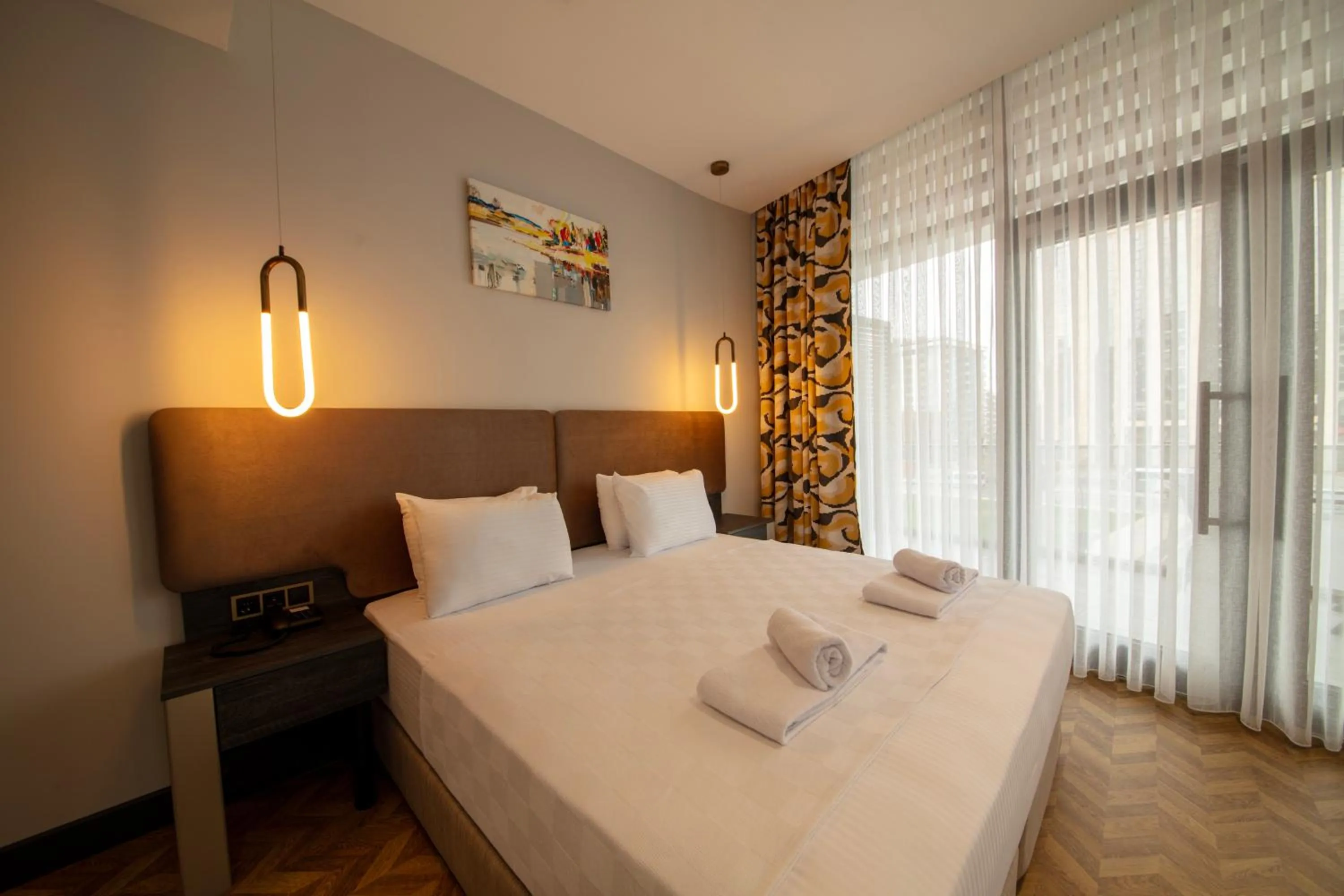 Bed in V Center Hotel