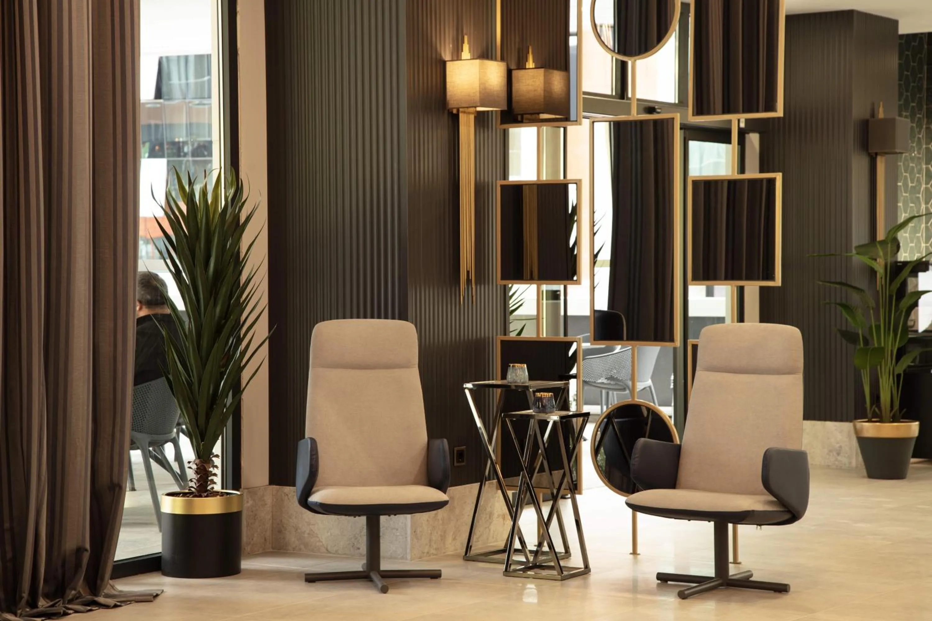 Seating area in V Center Hotel