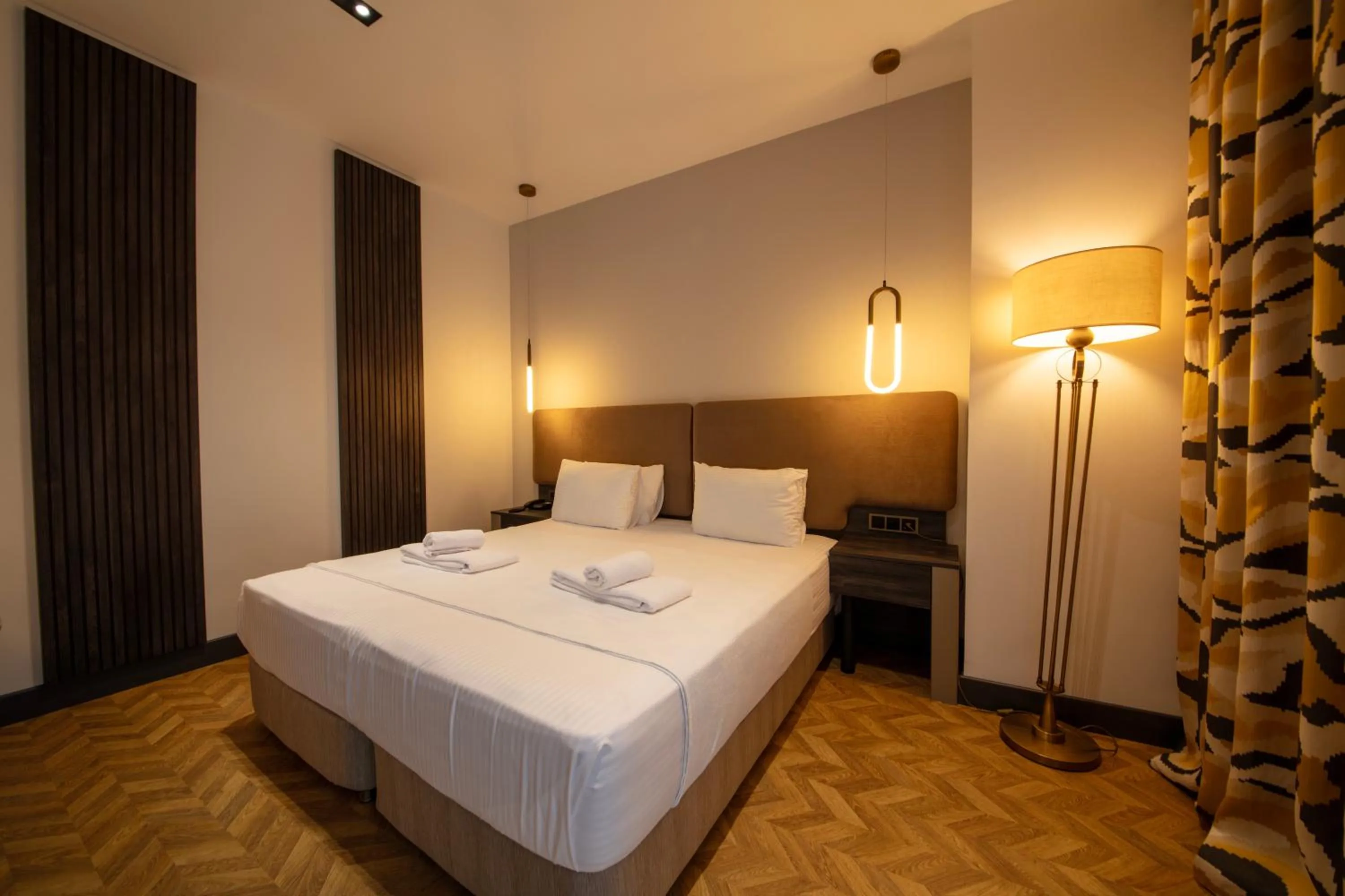 Bed in V Center Hotel