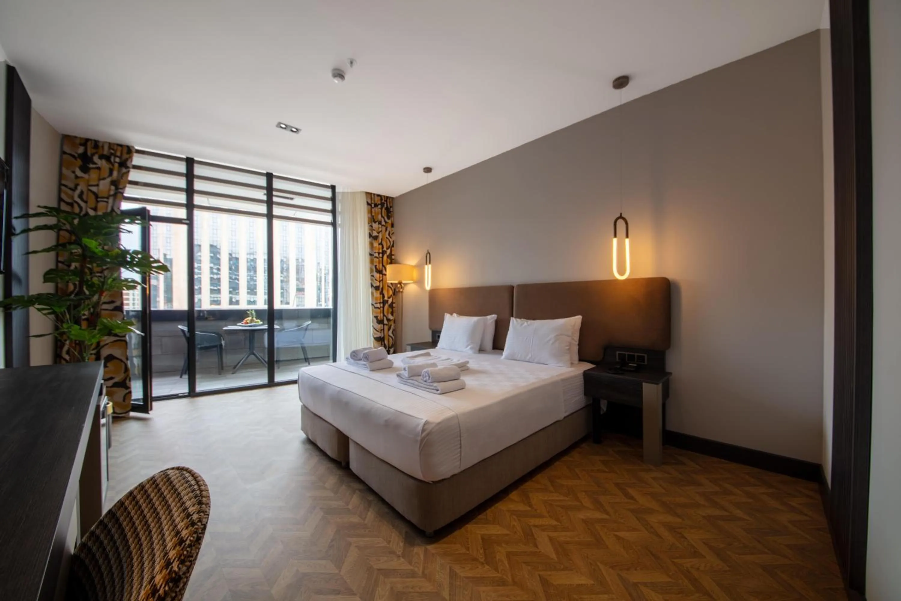 Bed in V Center Hotel