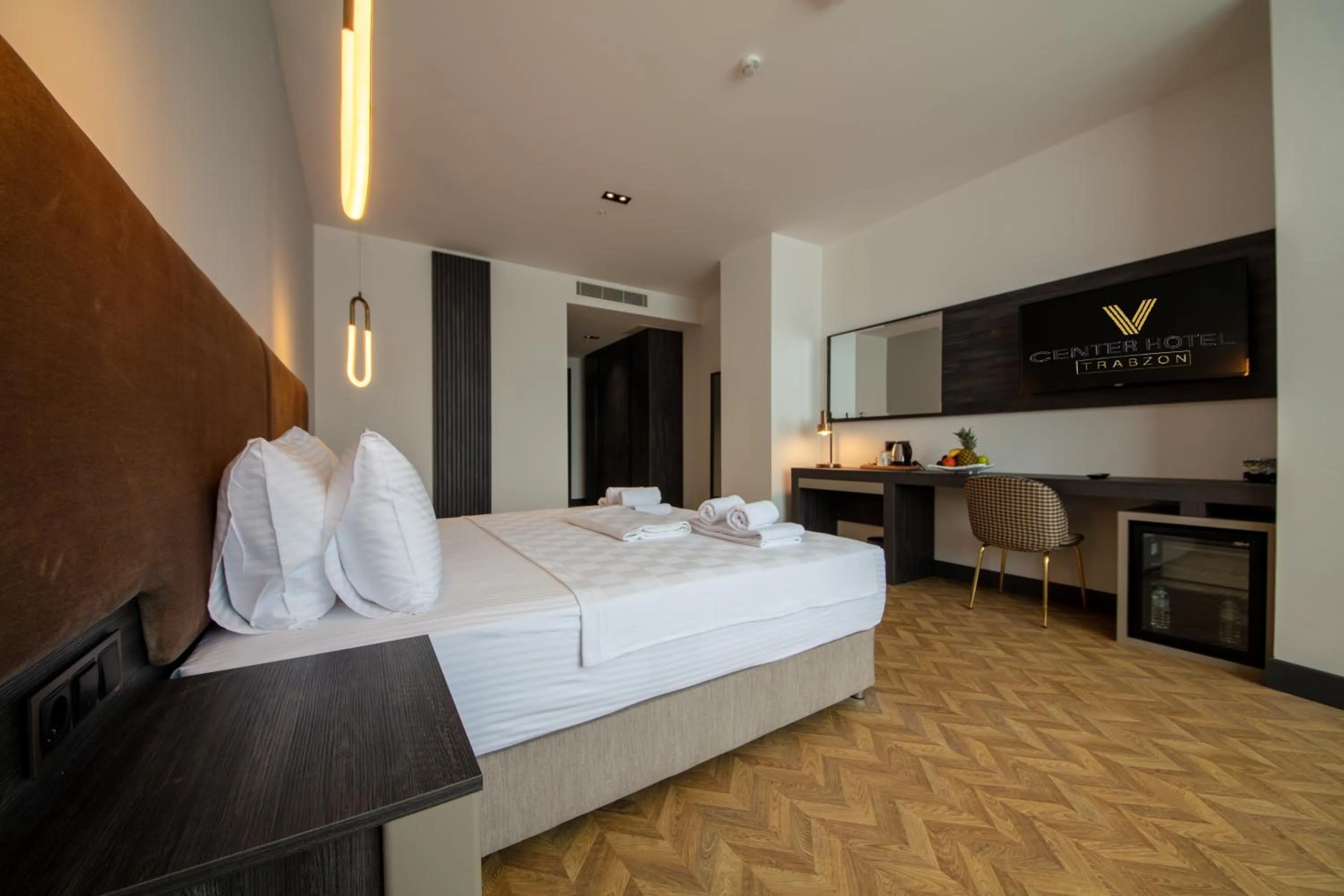 Bed in V Center Hotel