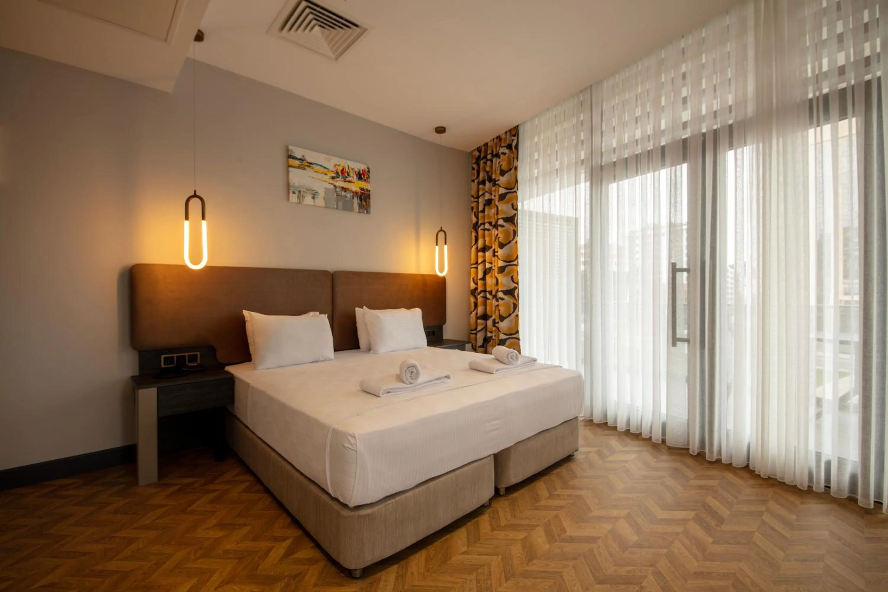 Bed in V Center Hotel