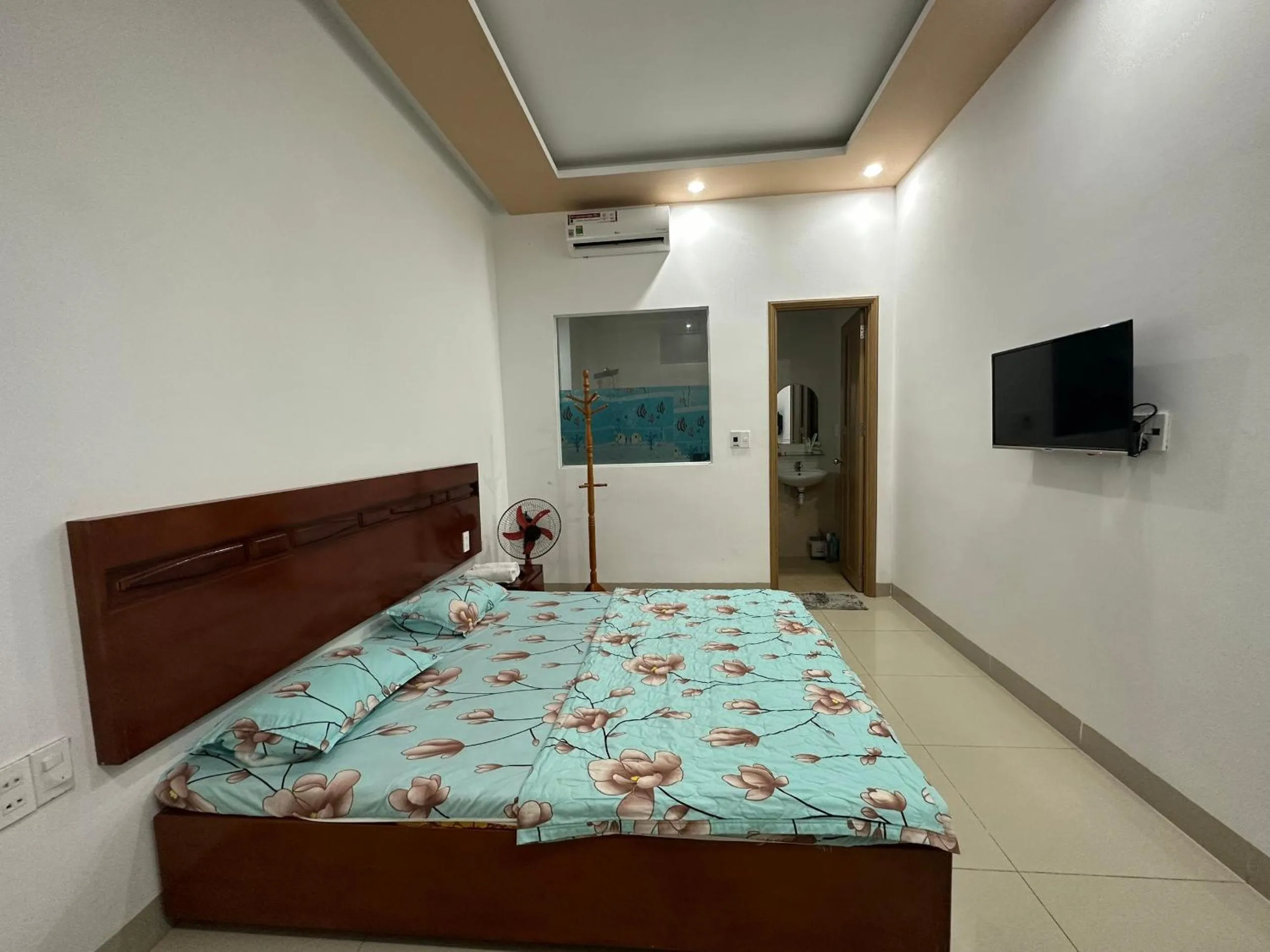 Bedroom in OYO 1191 Happy Motel