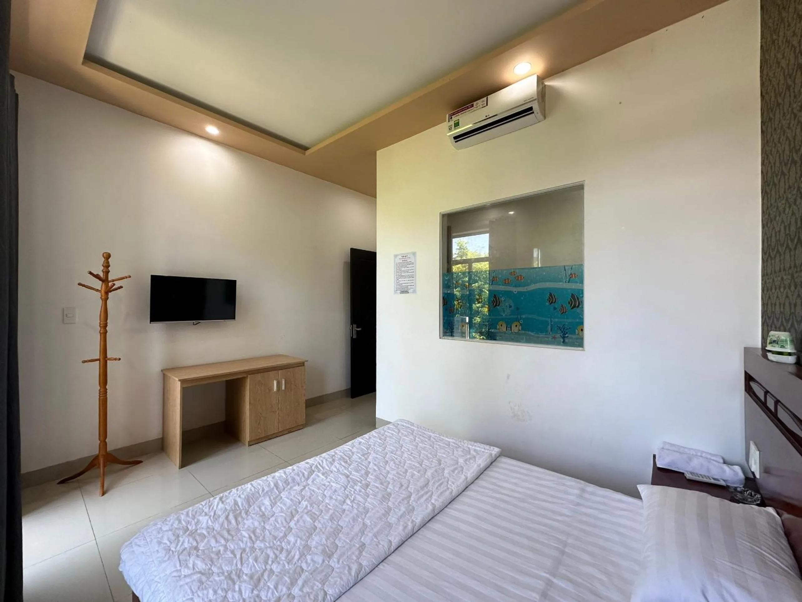 Bedroom in OYO 1191 Happy Motel