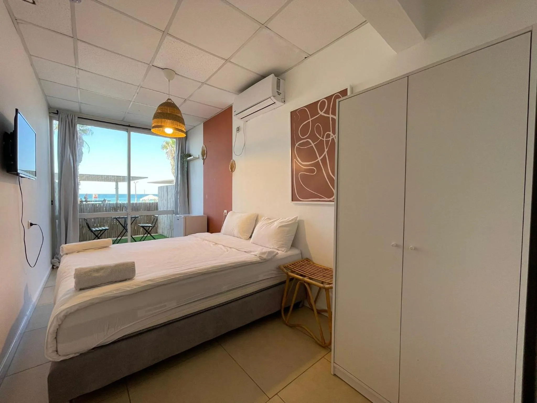 Bed in Central Beach Hotel