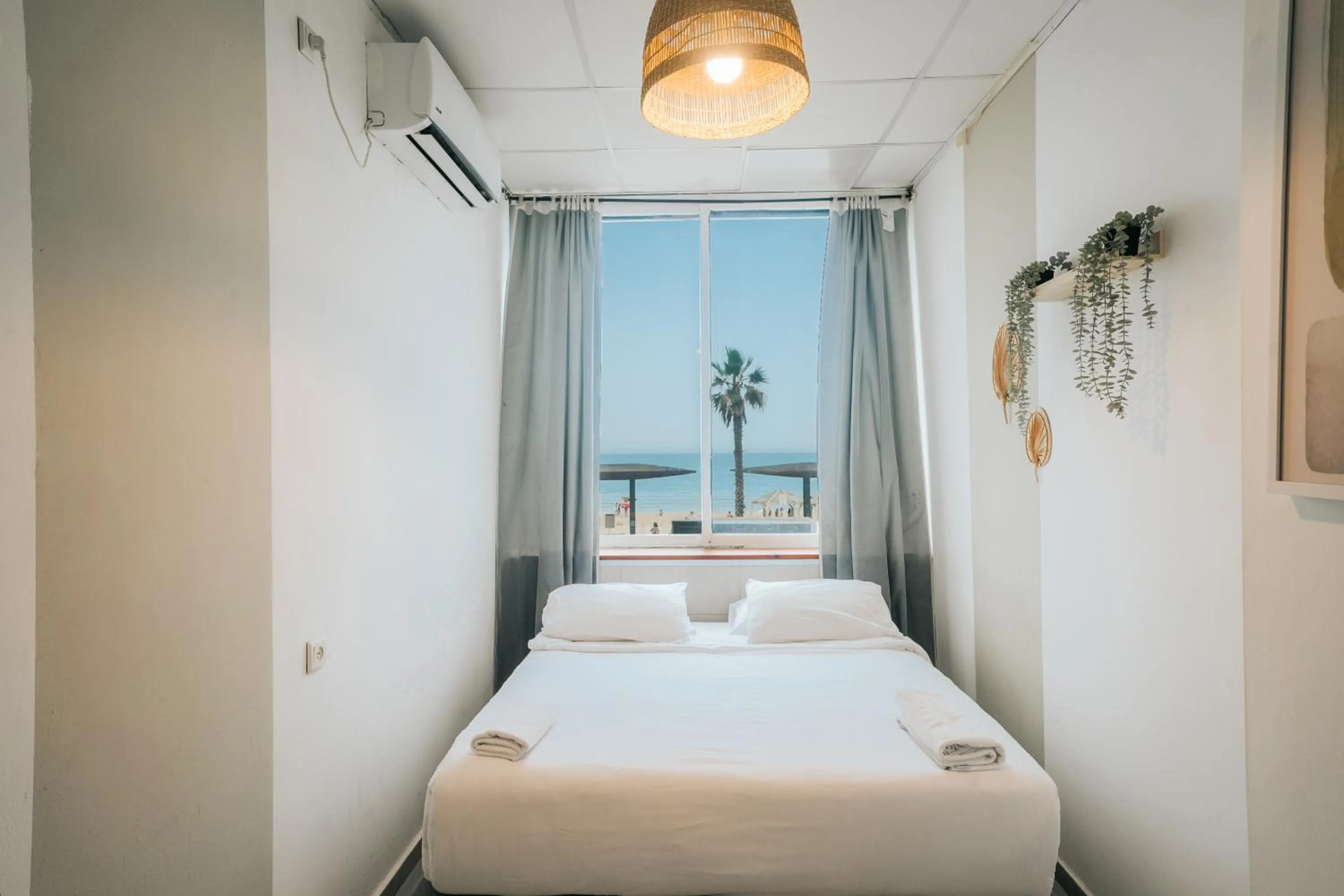 Bed in Central Beach Hotel