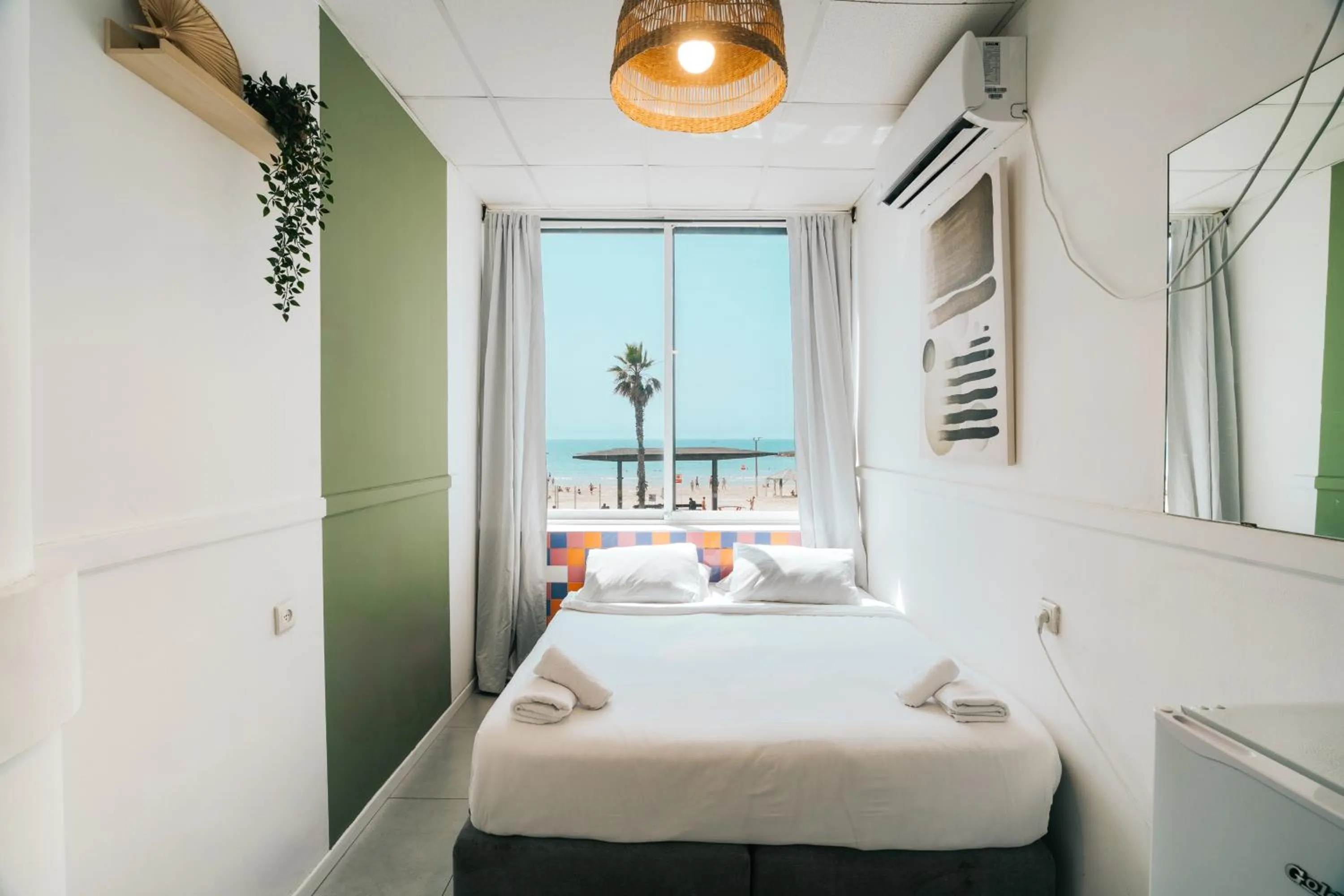 Bed in Central Beach Hotel