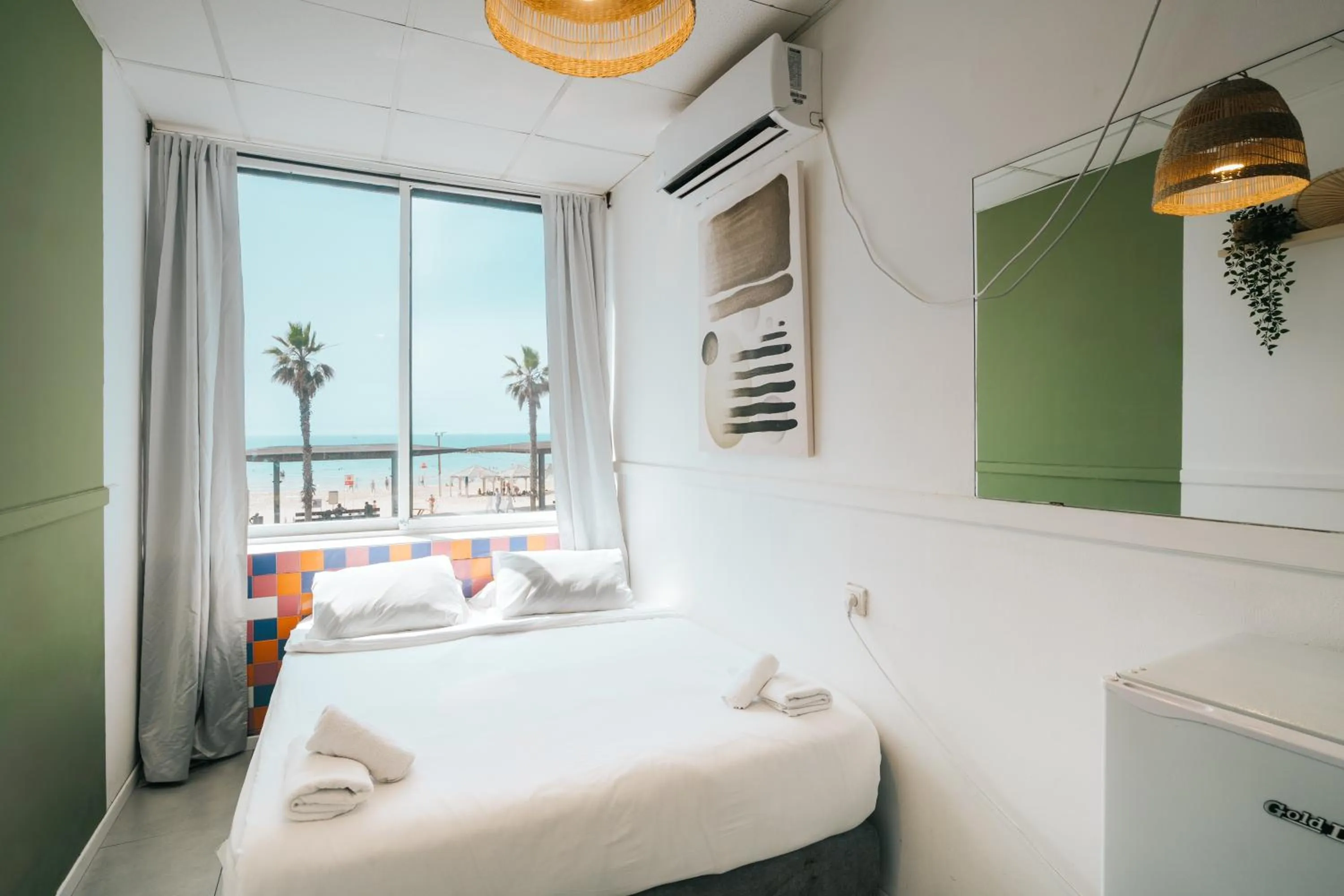 Bed in Central Beach Hotel