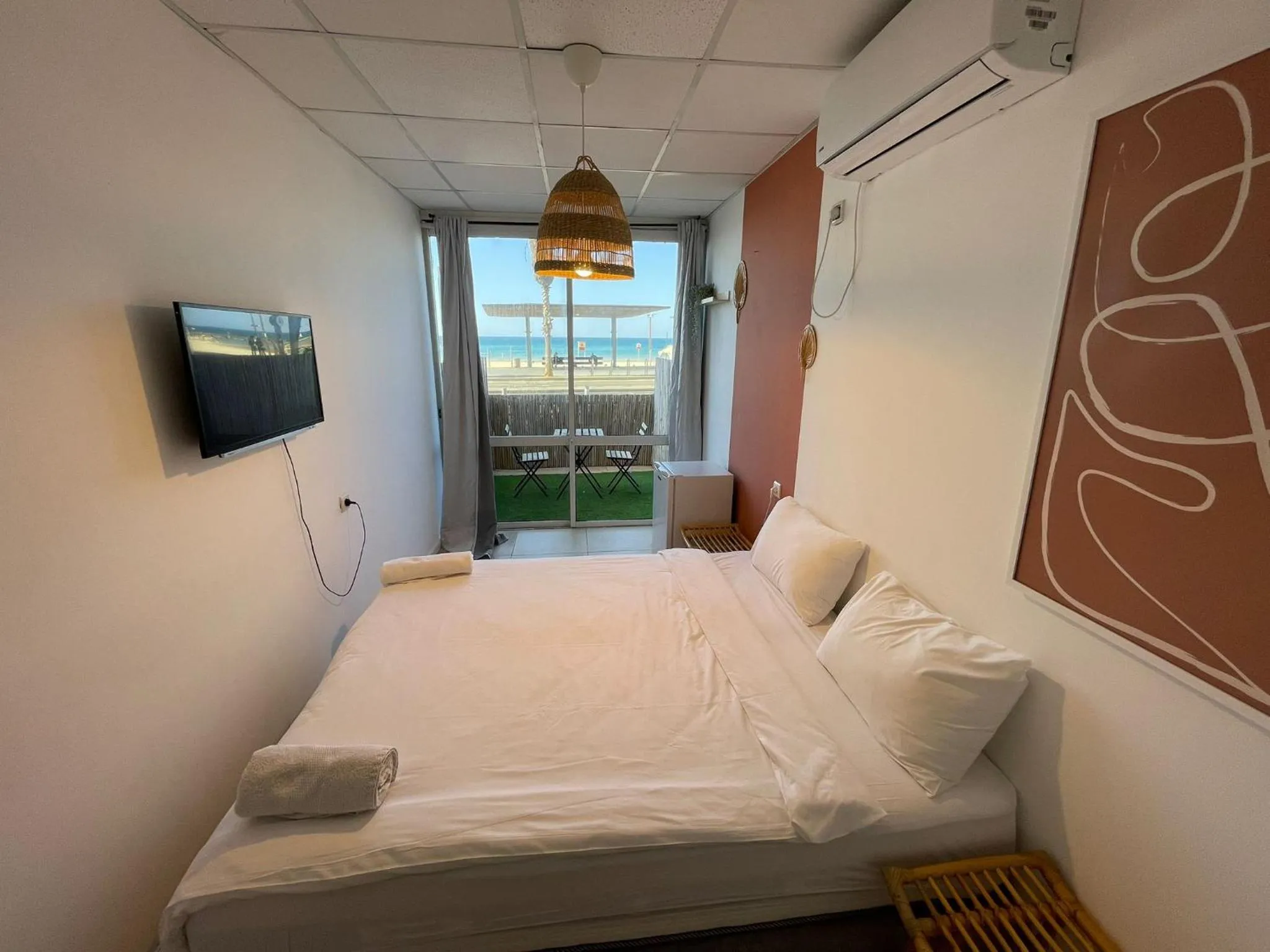 Bed in Central Beach Hotel