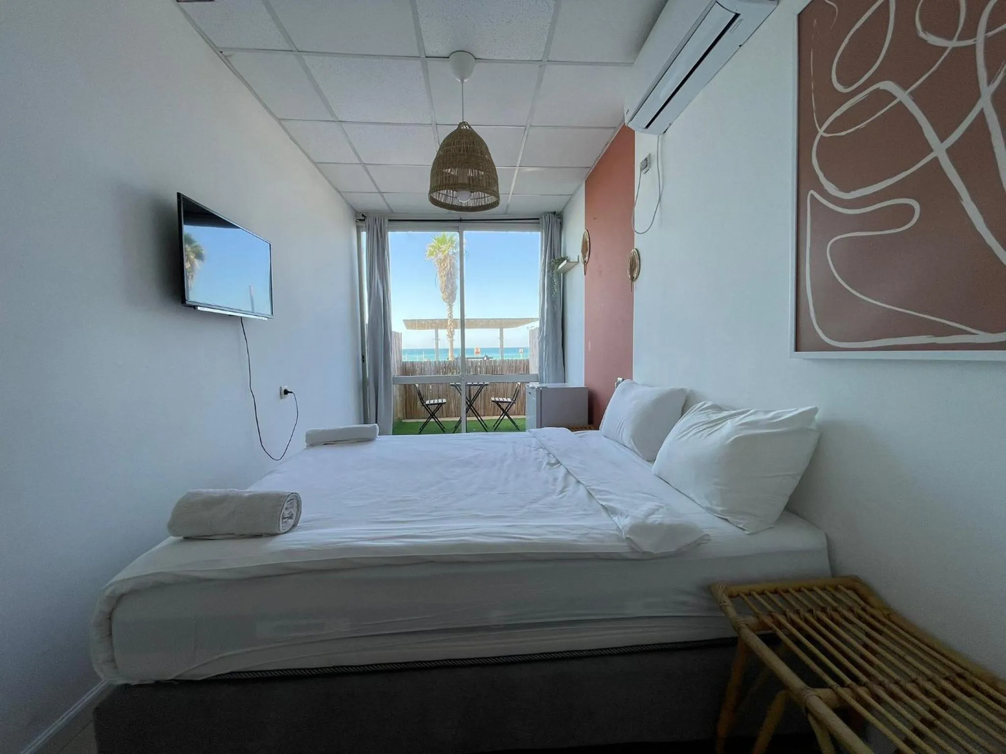 Bed in Central Beach Hotel