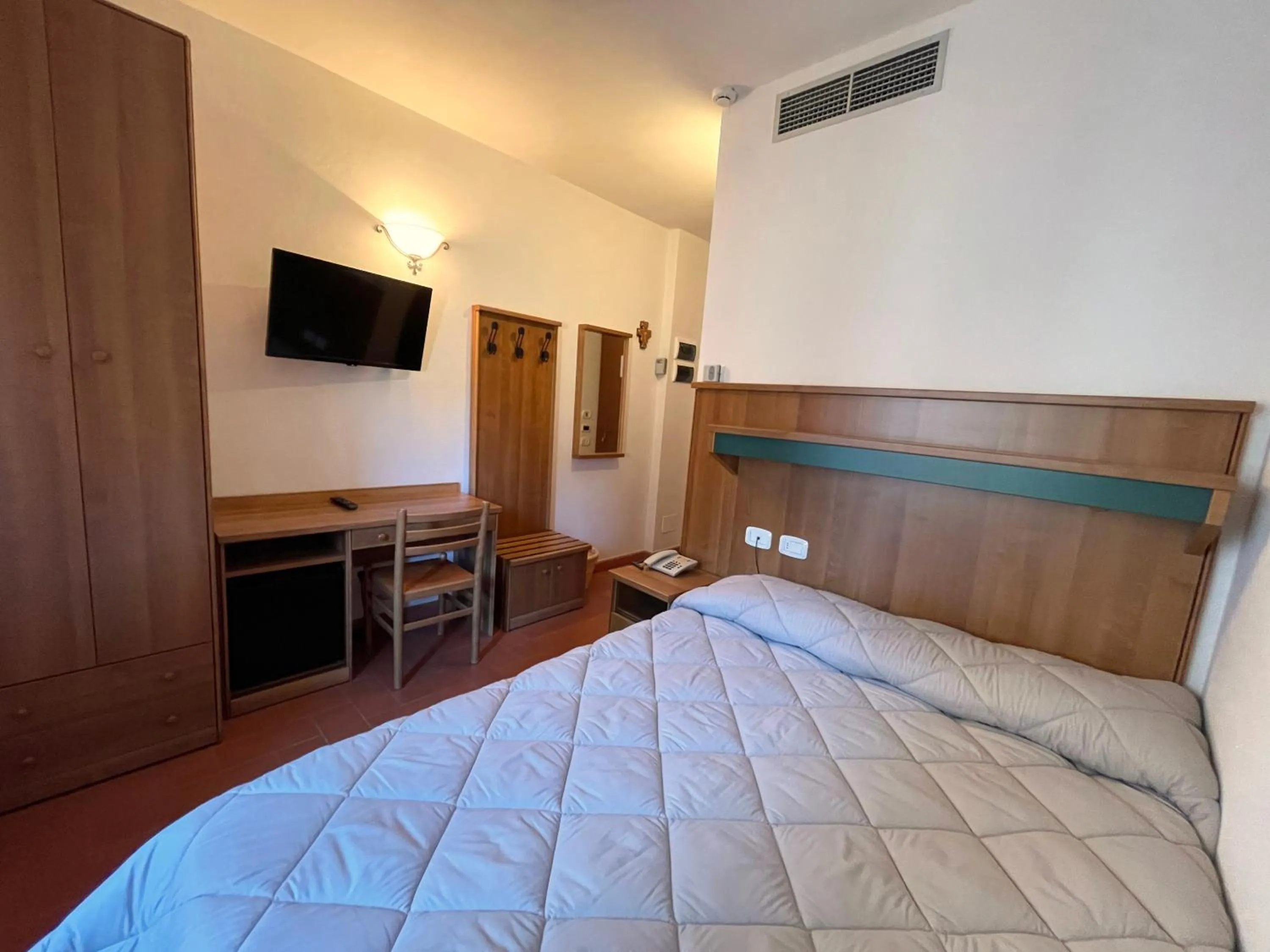 Bed in Hotel Rifugio la Foresta