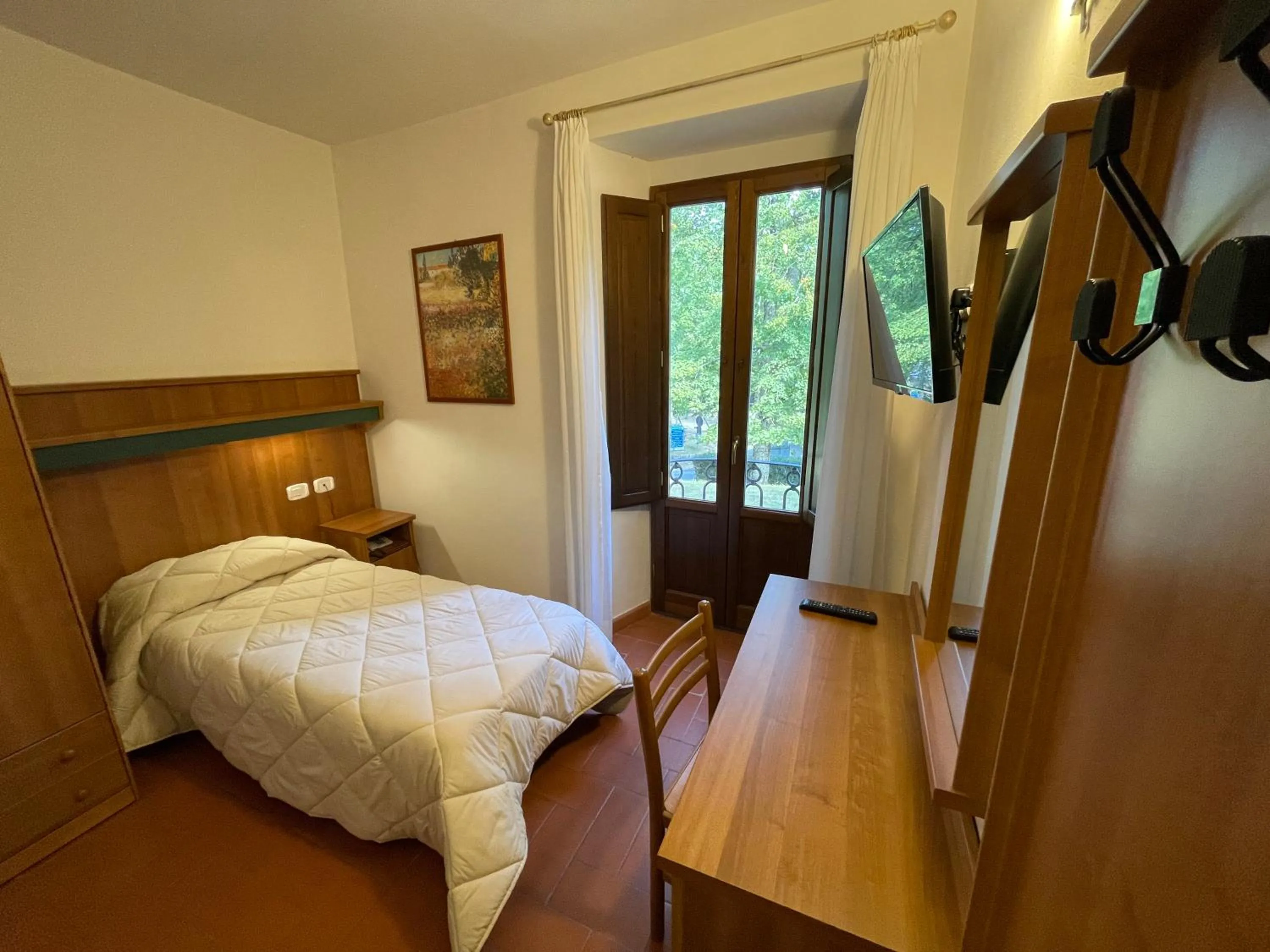 Bedroom, Bed in Hotel Rifugio la Foresta