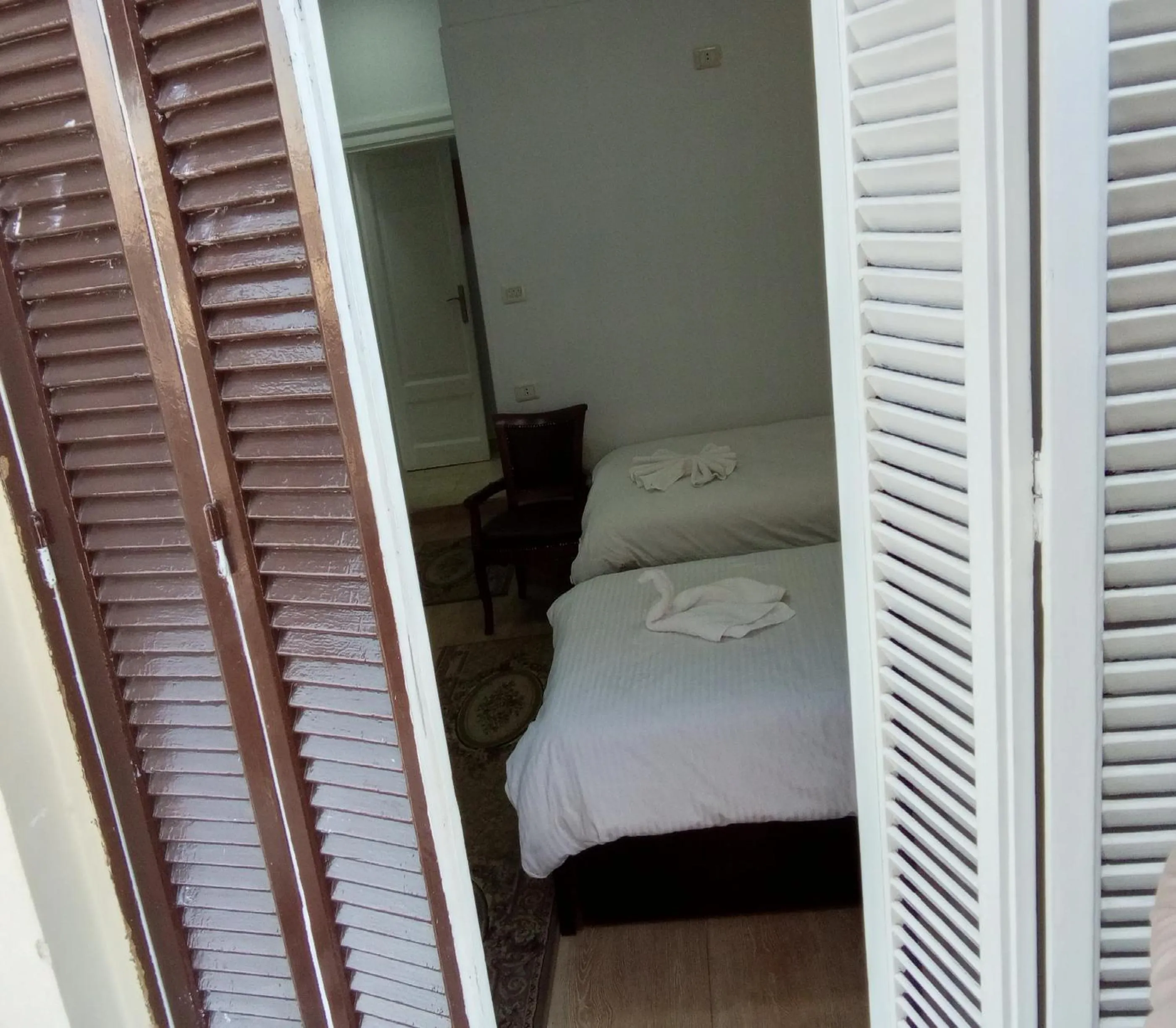 Photo of the whole room, Bed in New Panorama Palace