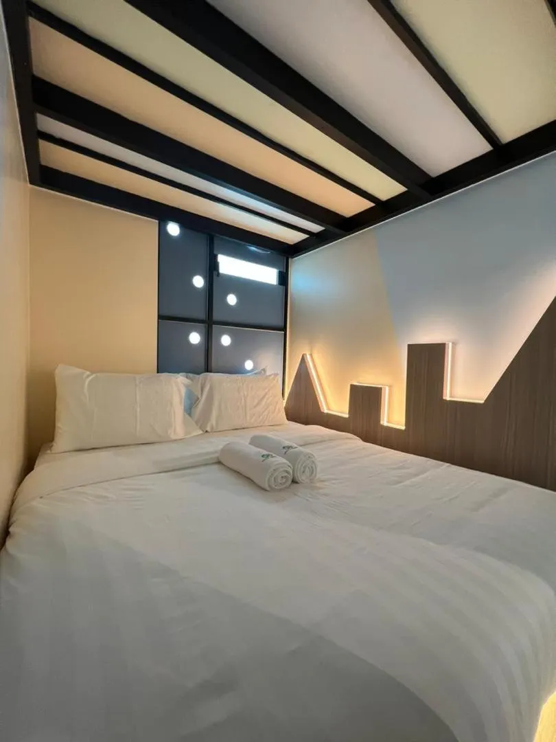 Bed in Cubic Botanical Suites Bangsar South by HomeBrickz