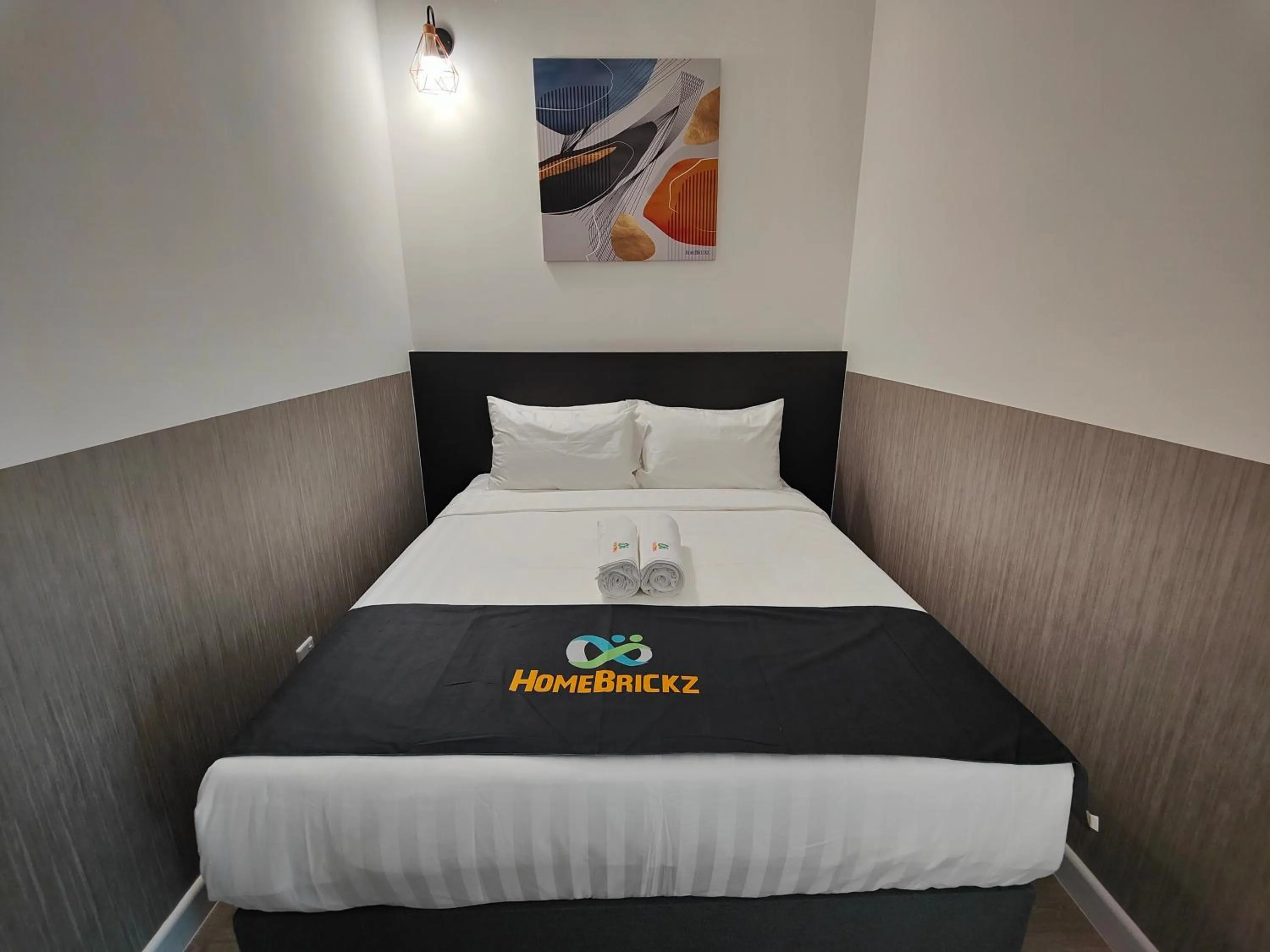 Photo of the whole room, Bed in Cubic Botanical Suites Bangsar South by HomeBrickz