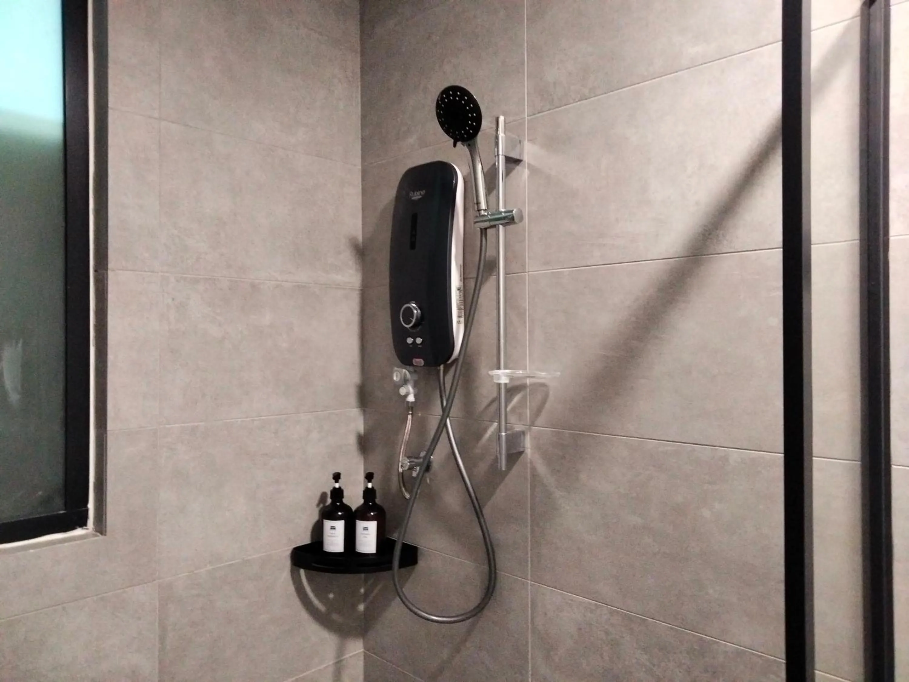 Shower in Cubic Botanical Suites Bangsar South by HomeBrickz