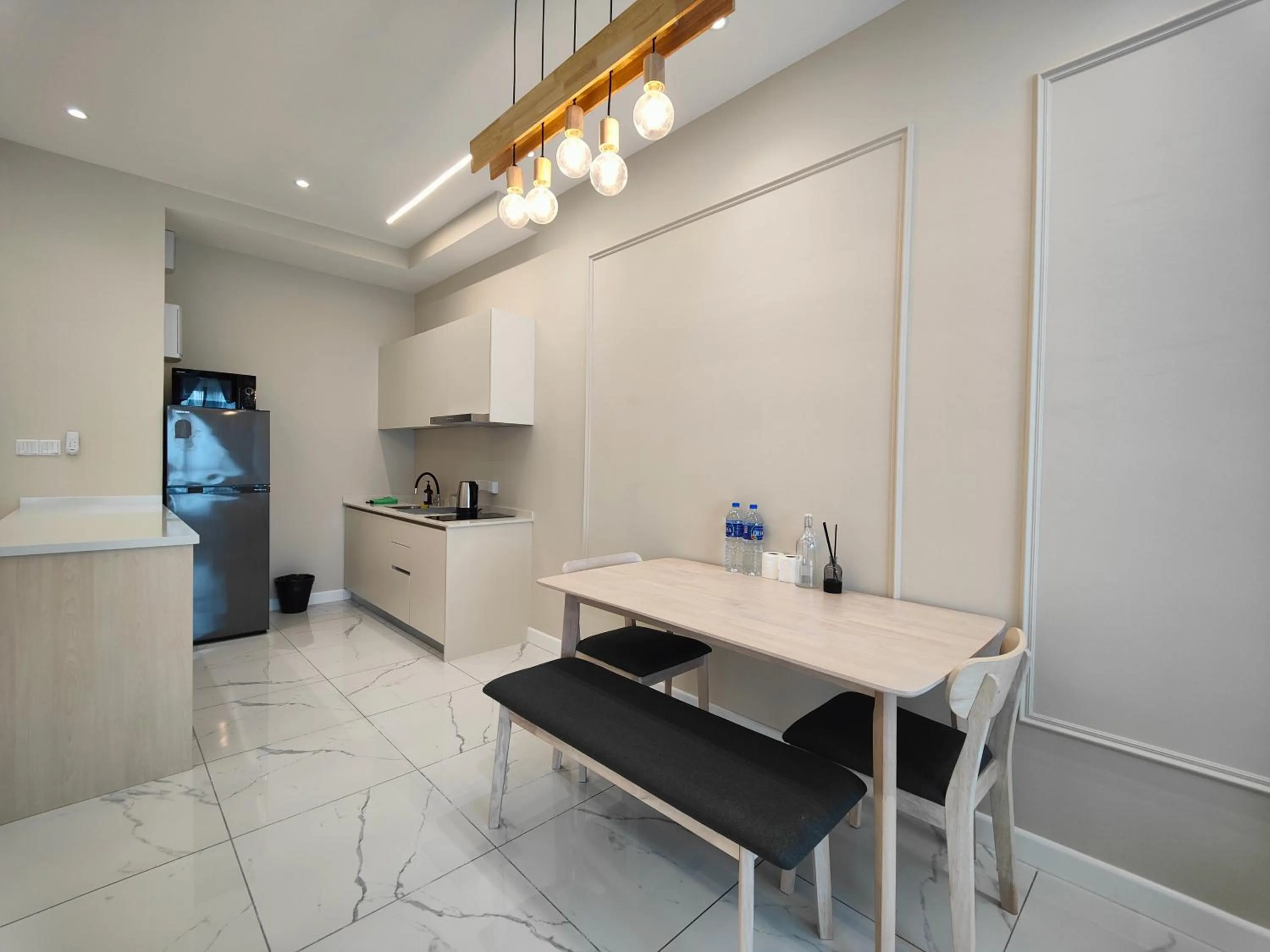 Kitchen or kitchenette in Cubic Botanical Suites Bangsar South by HomeBrickz