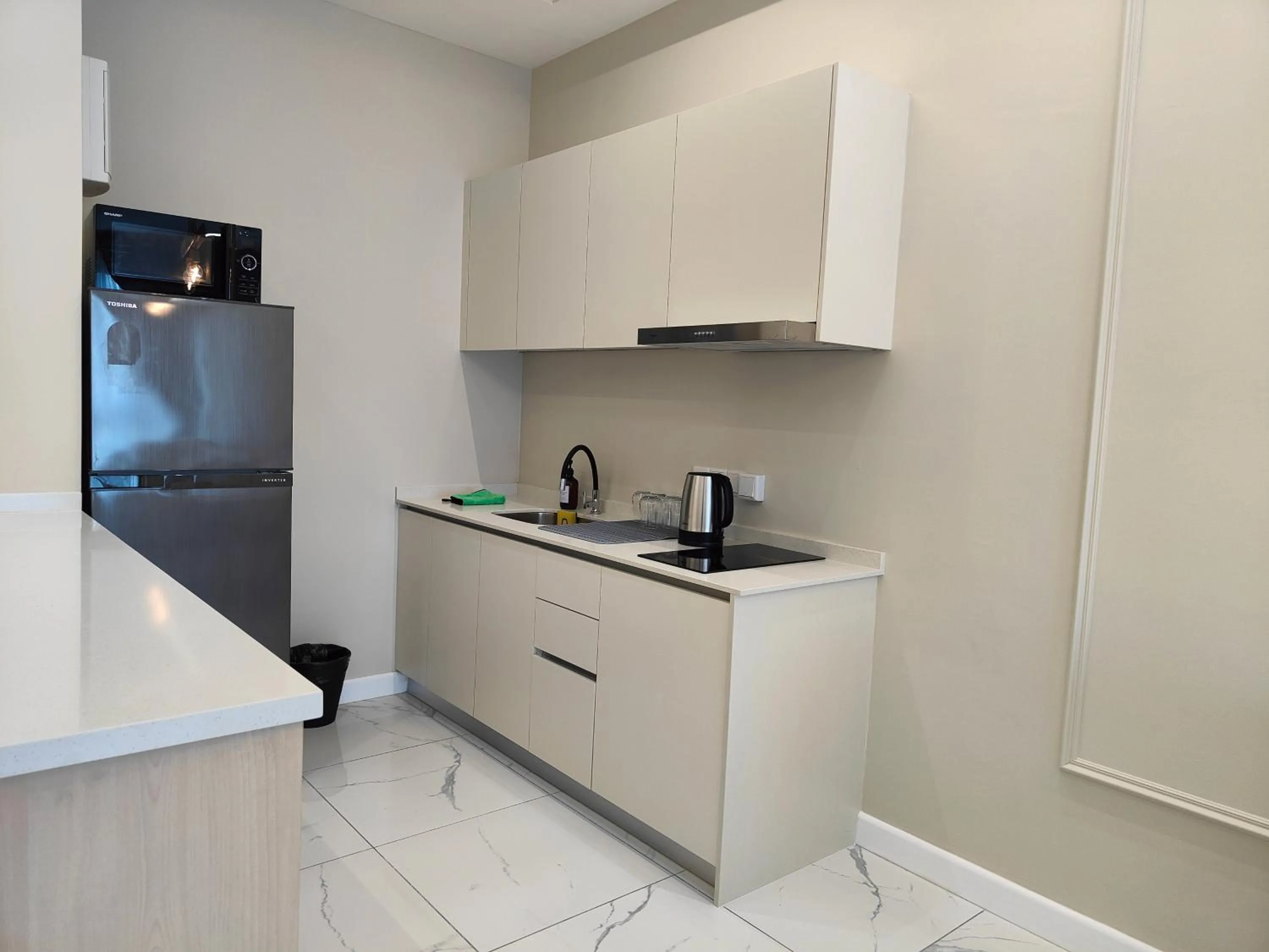 Kitchen or kitchenette in Cubic Botanical Suites Bangsar South by HomeBrickz