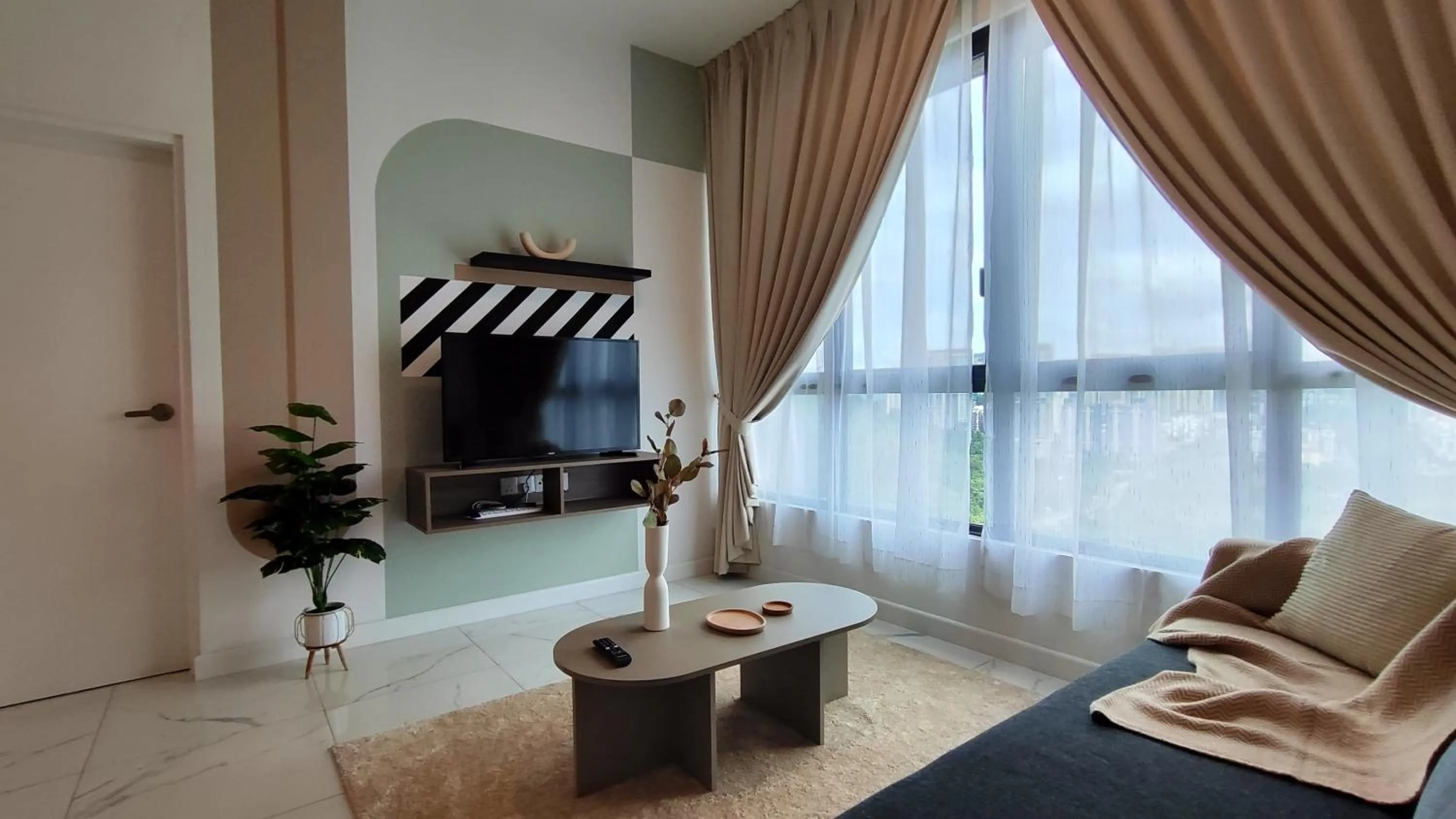 Living room in Cubic Botanical Suites Bangsar South by HomeBrickz