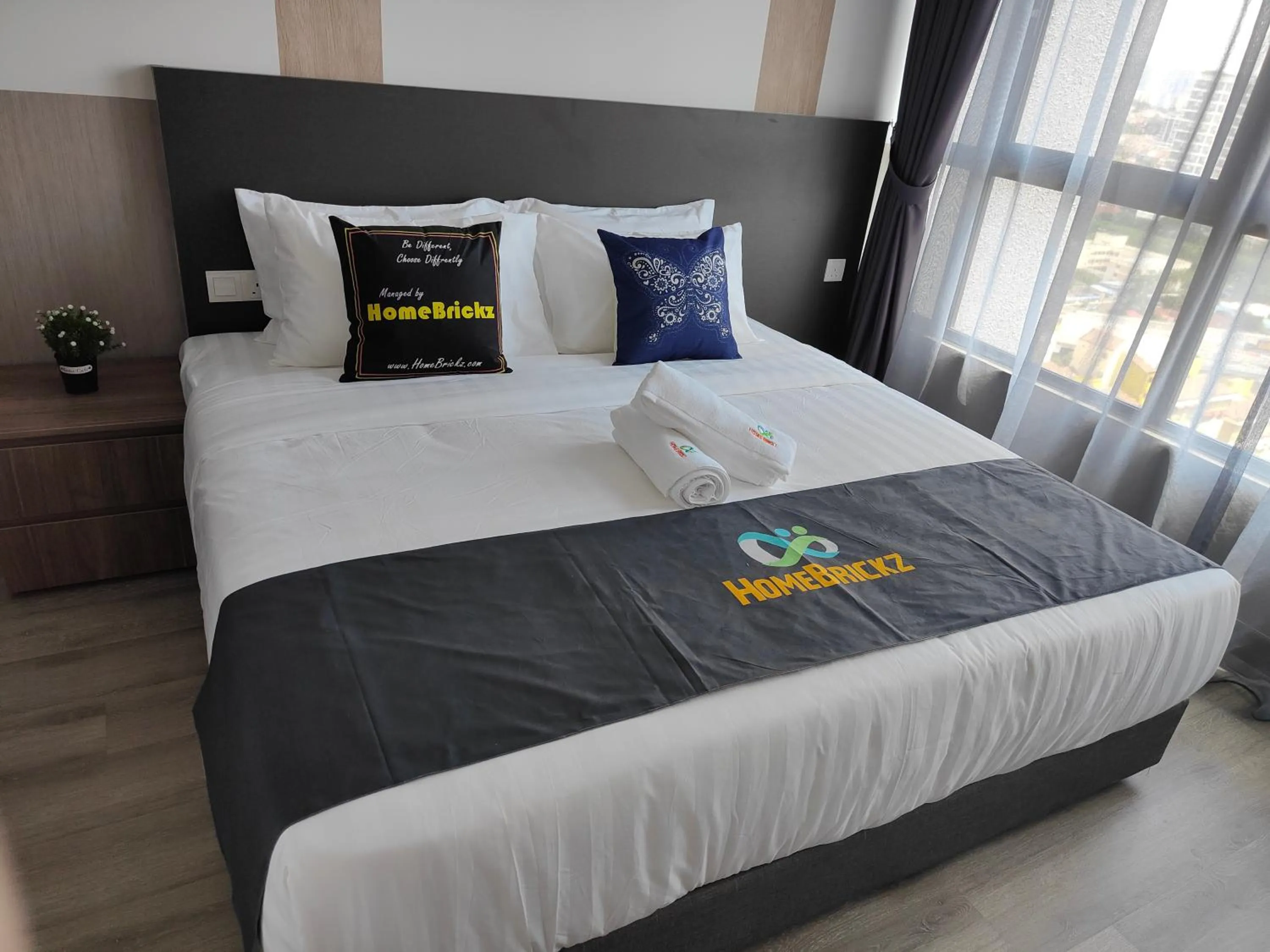 Bed in Cubic Botanical Suites Bangsar South by HomeBrickz