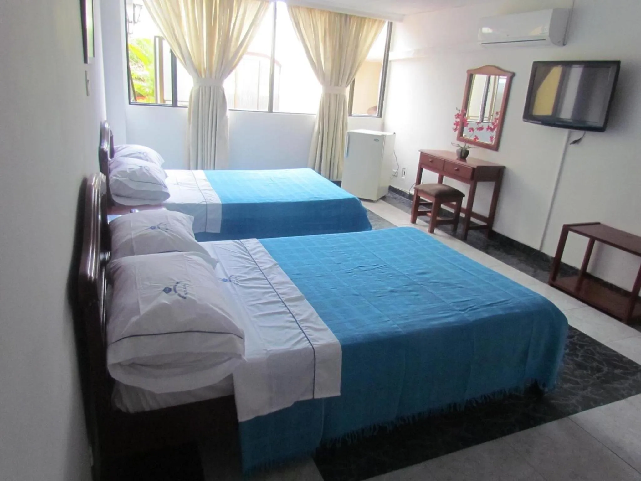 Photo of the whole room, Bed in HOTEL DINASTIA REAL NEIVA