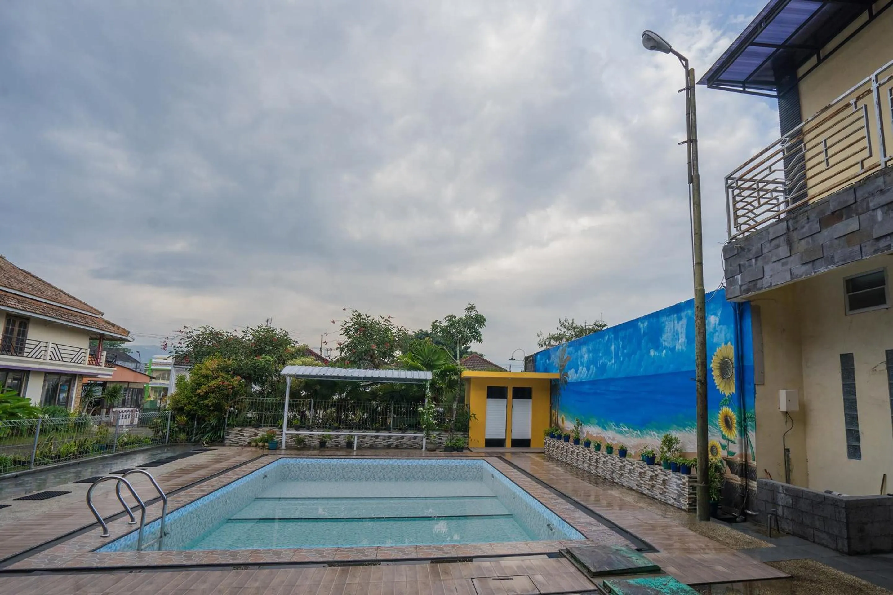 Swimming pool in Hotel O Central Batu Near Jatim Park 3 Formerly Bunga Matahari Hotel