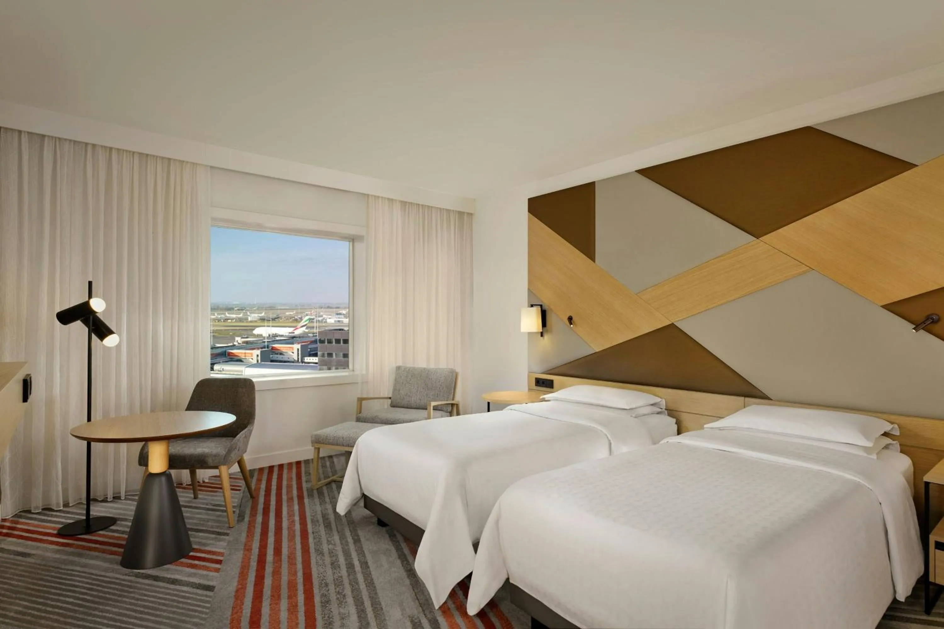 Photo of the whole room, Bed in Sheraton Amsterdam Airport Hotel and Conference Center