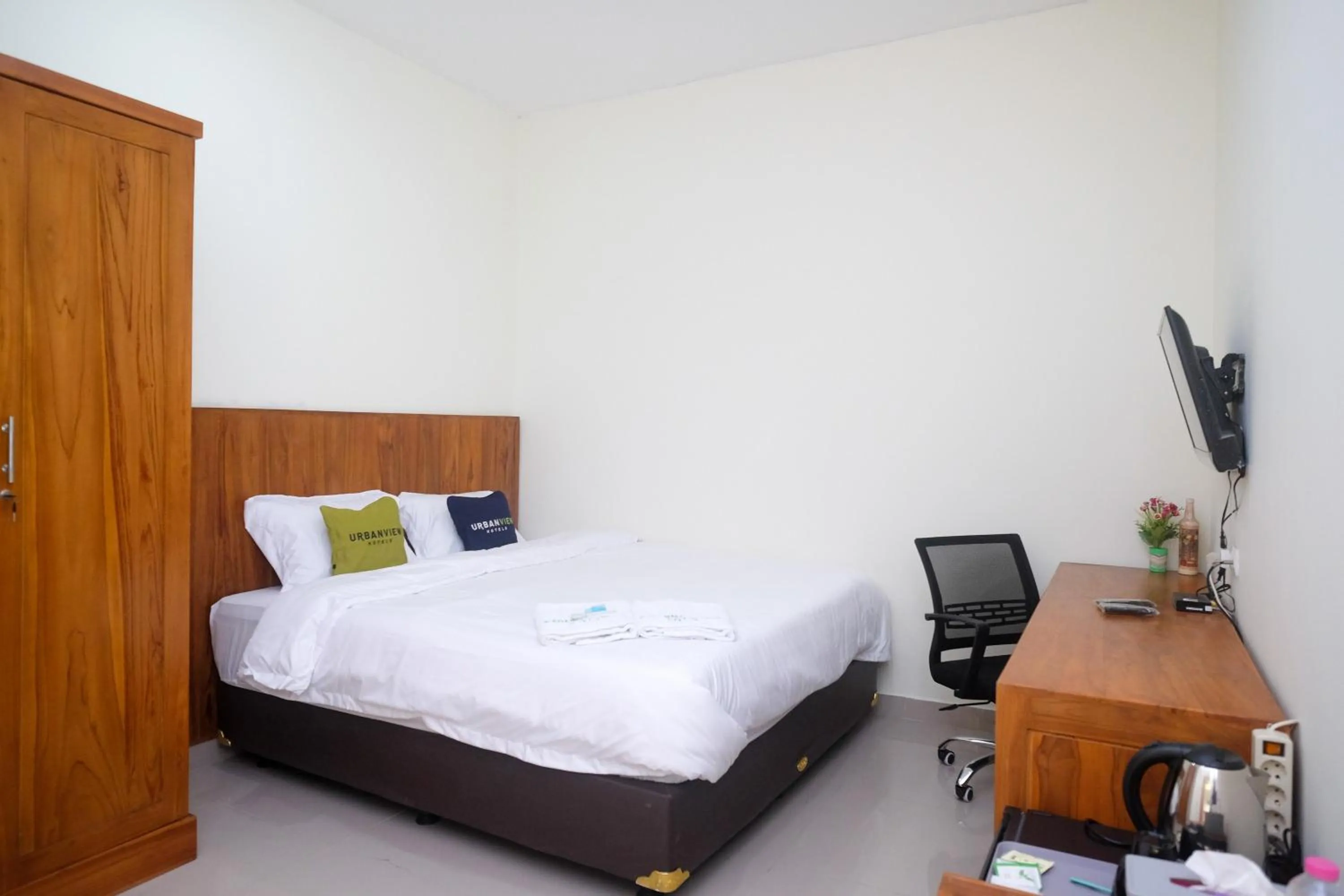 Bed in Urbanview Syariah Kadarman Home Laweyan by RedDoorz